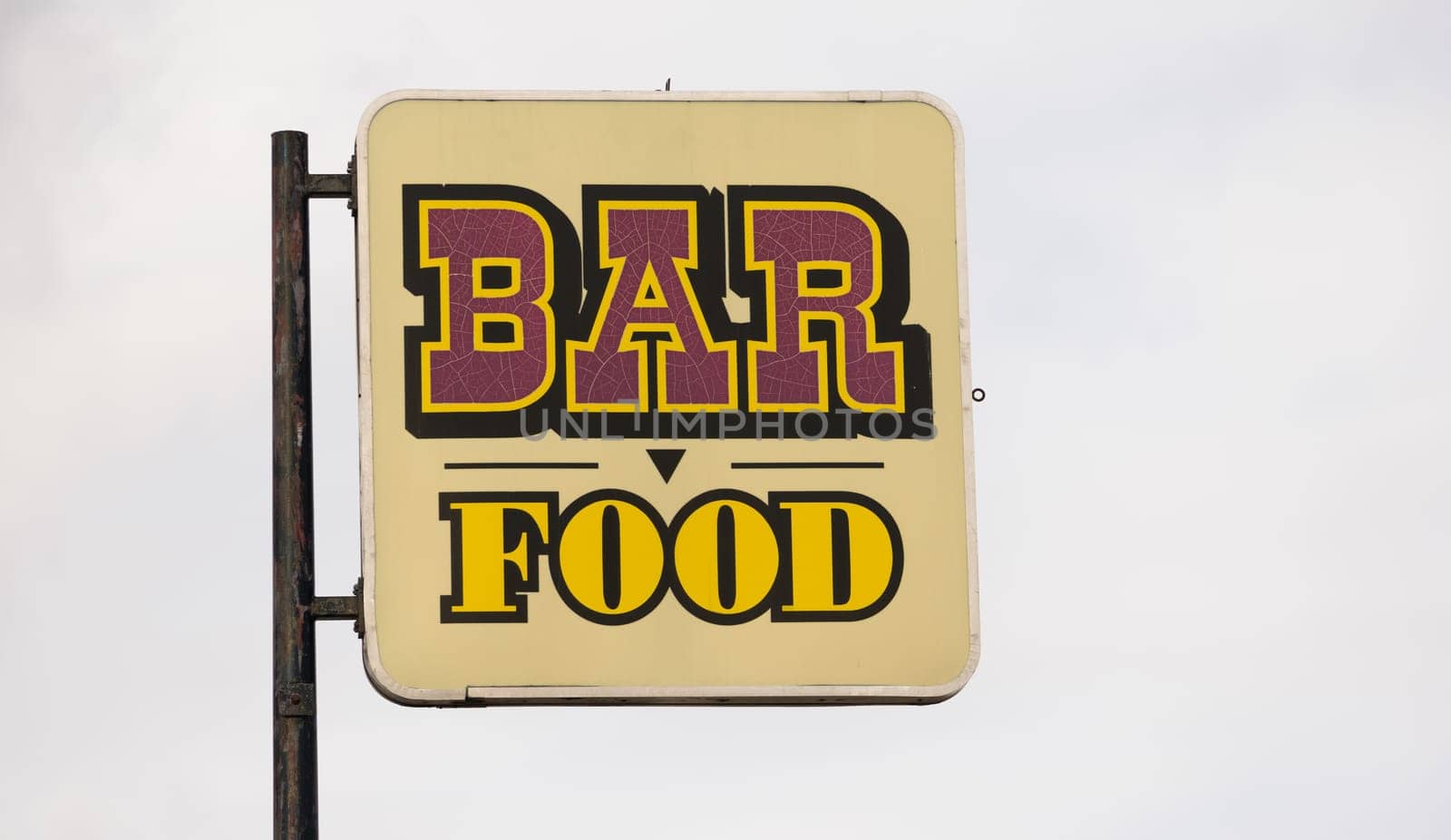 A generic roadside advertisement for a restaurant