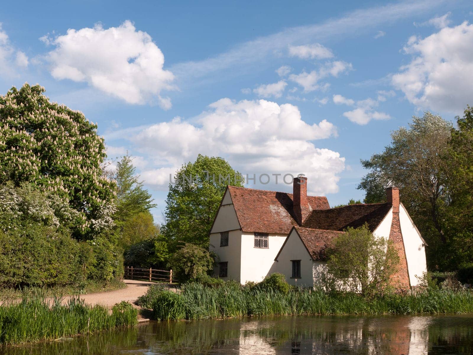 Willy Lott's Cottage outside in flatford mill in constable country old and famous location building from a painting on a summer afternoon with no people very beautiful