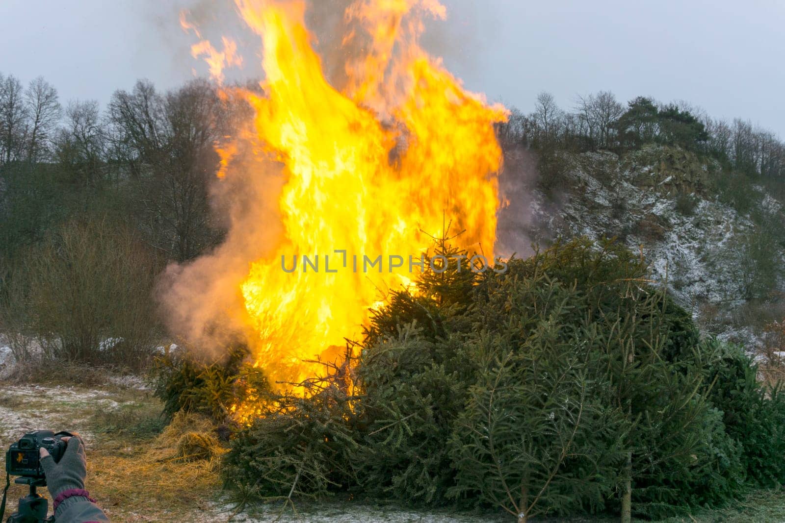 Christmas tree burning is photographed in Central Hesse