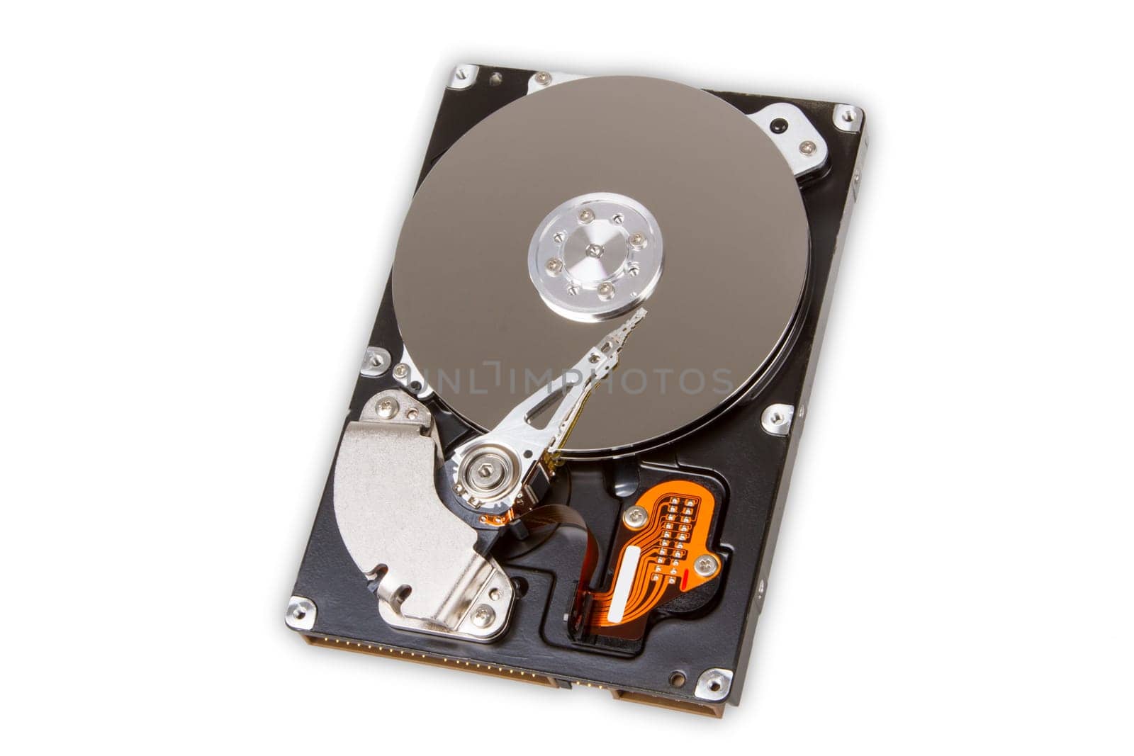 The inside of a hard disk drive on a light background