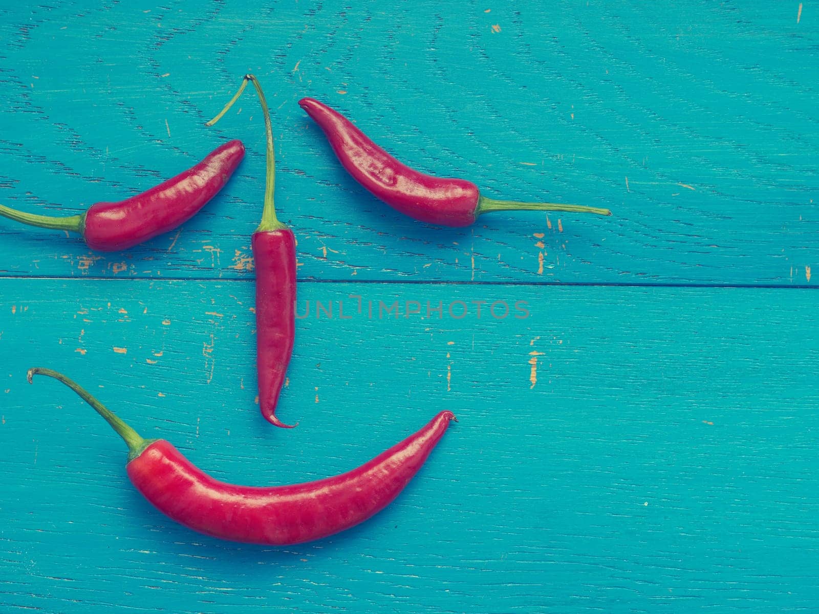 Close up of red hot pepperoni, vintage style colored, spicy ingredients, space for text