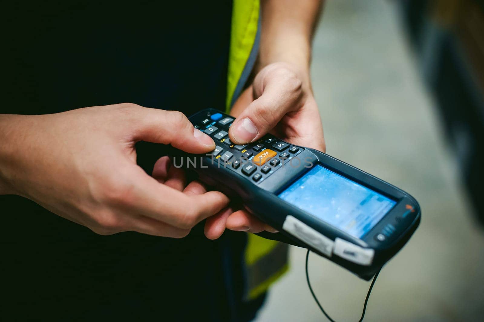 Worker Checking and Scanning Package by tablet handheld In Warehouse.