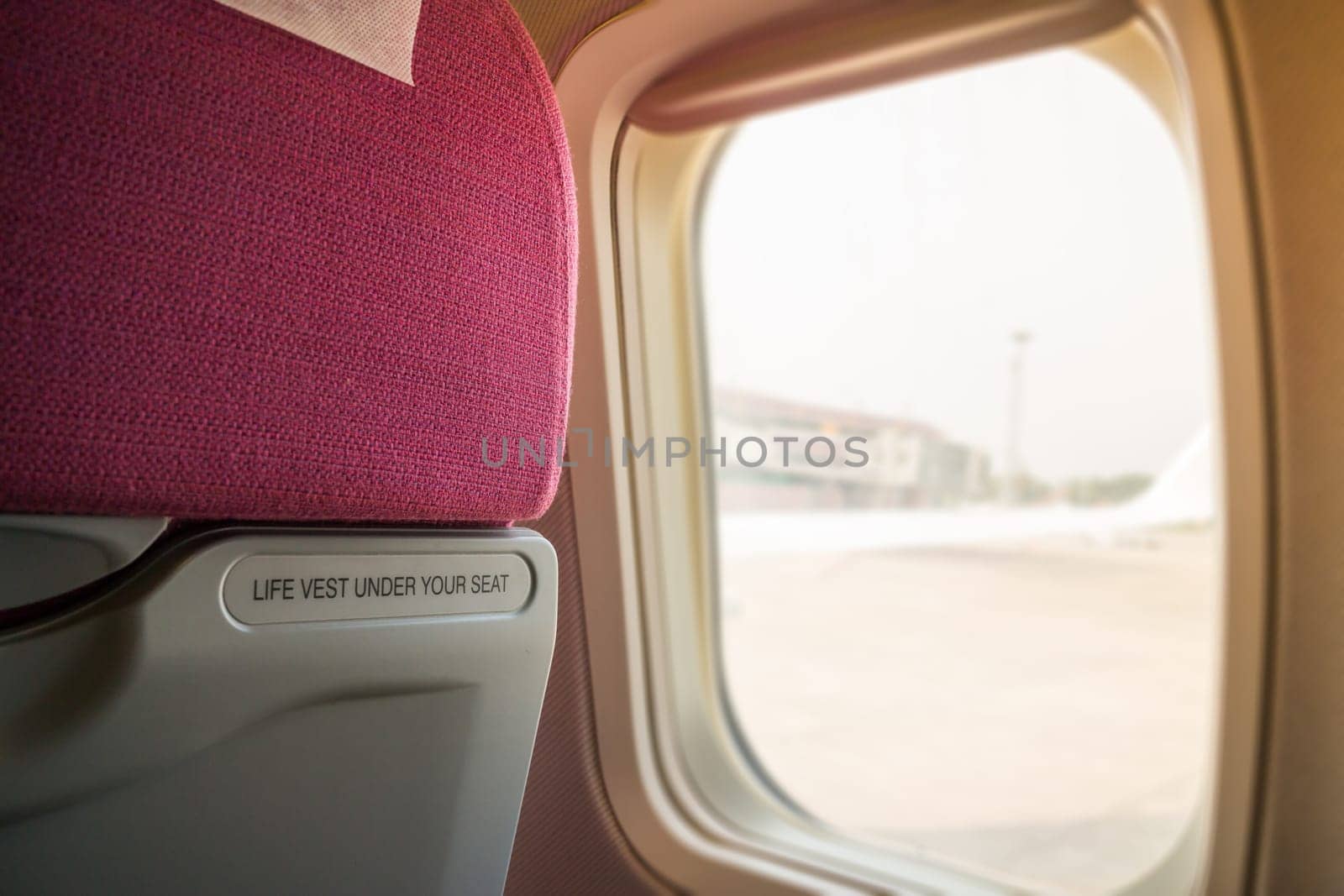 Interior Of Airplane Seat With Window Light, stock photo