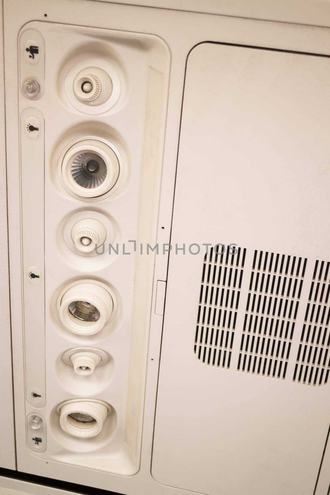 Interior Of Airplane Seat With Ceiling Button, stock photo