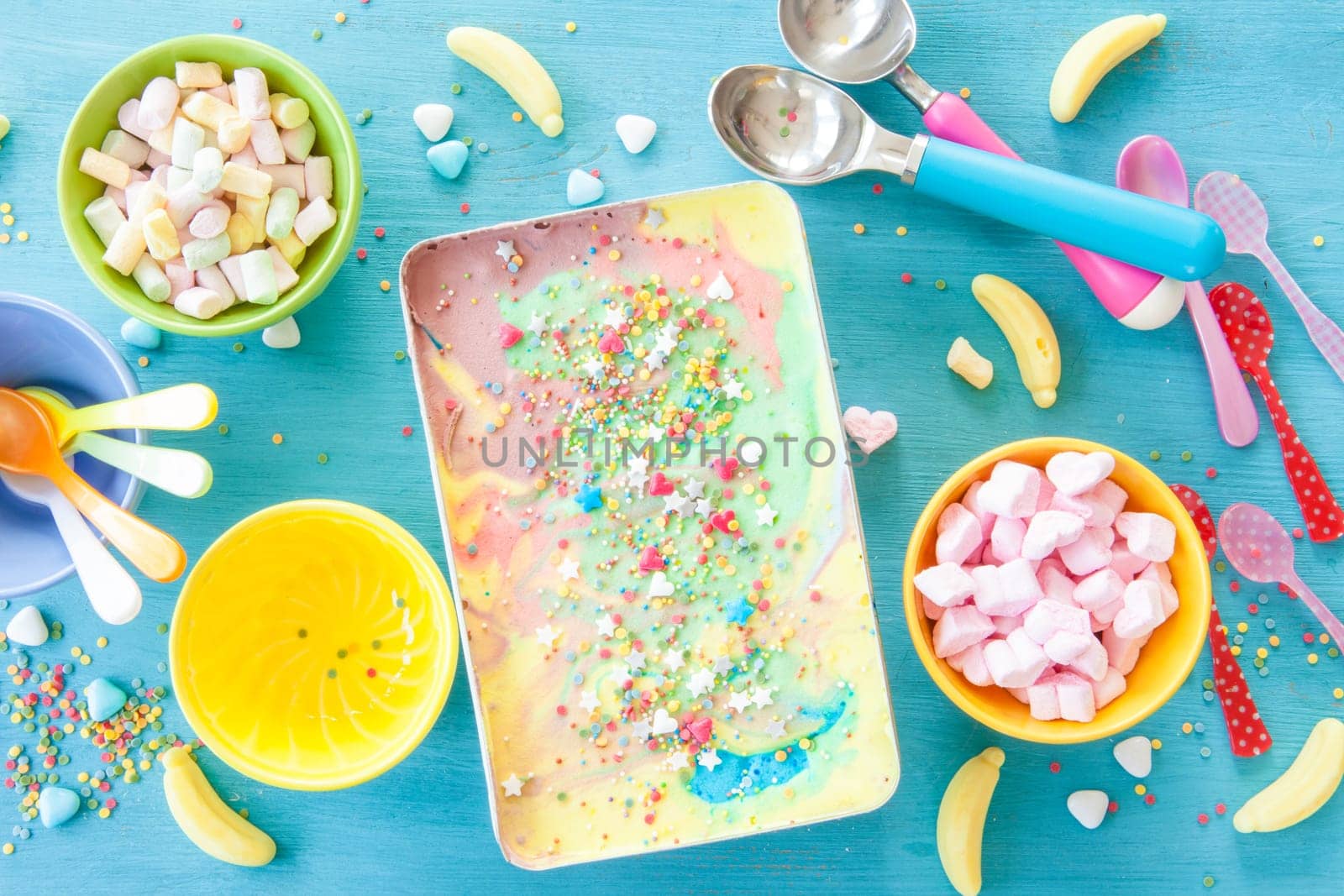 Colorful ice cream with sugar sprinkles and marshmallows