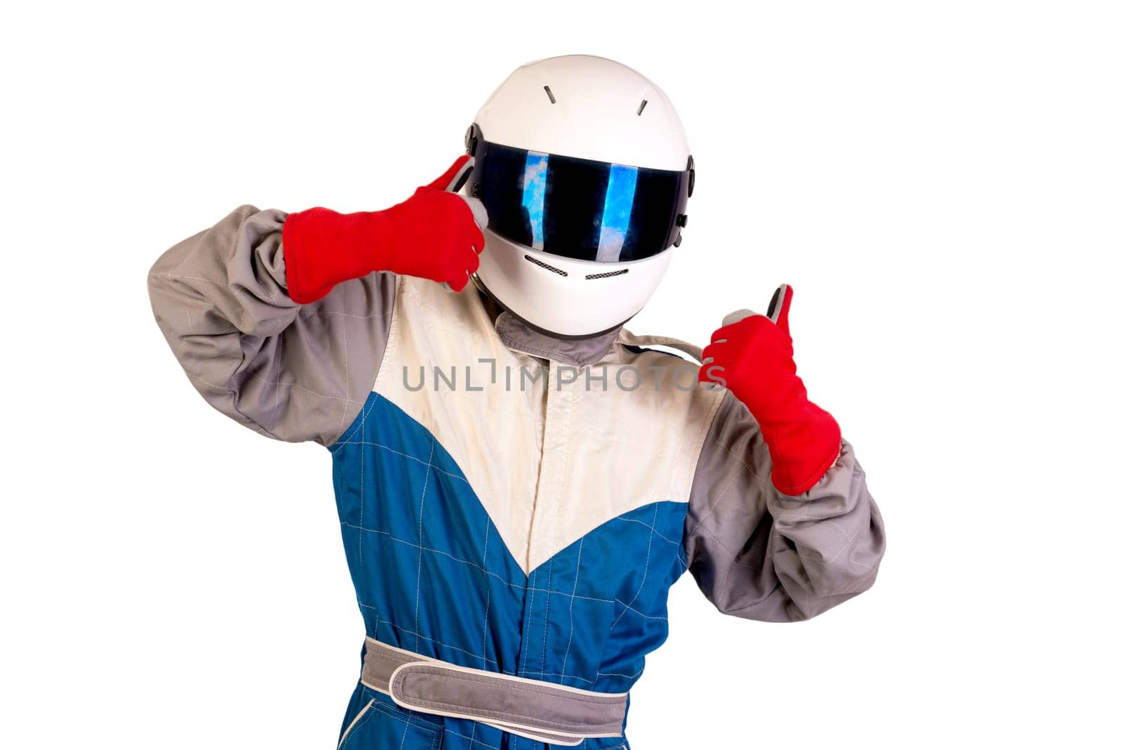 Racing driver posing with helmet isolated in white