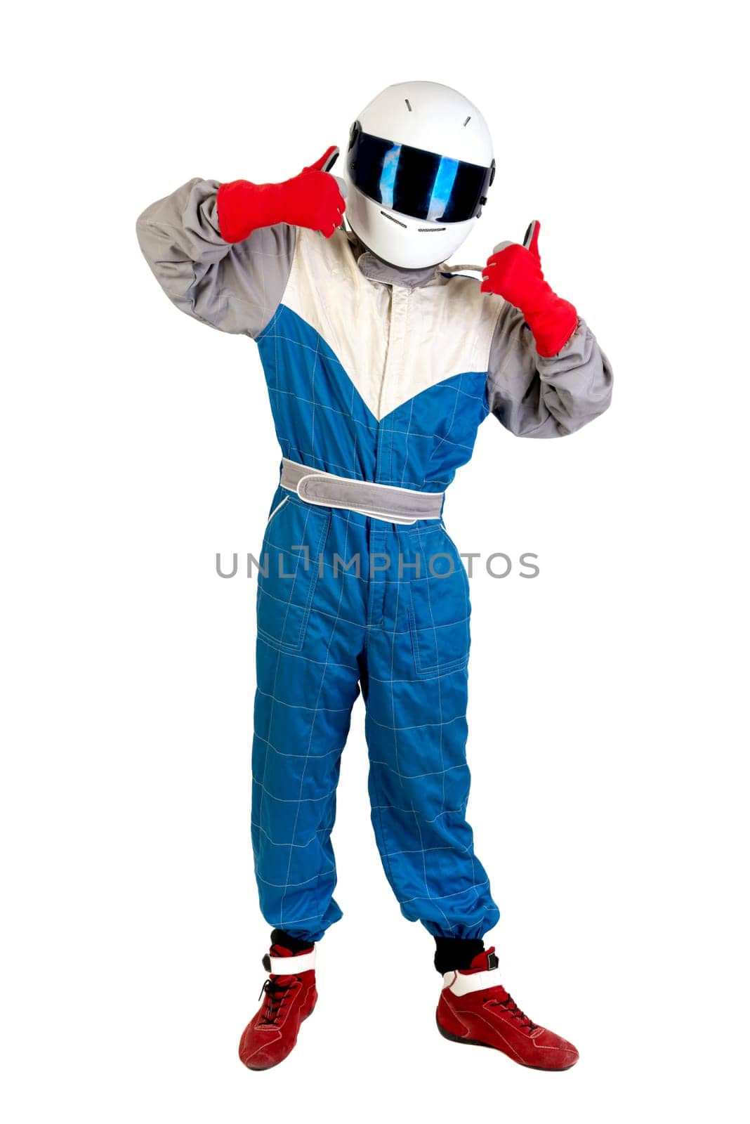 Racing driver posing with helmet isolated in white
