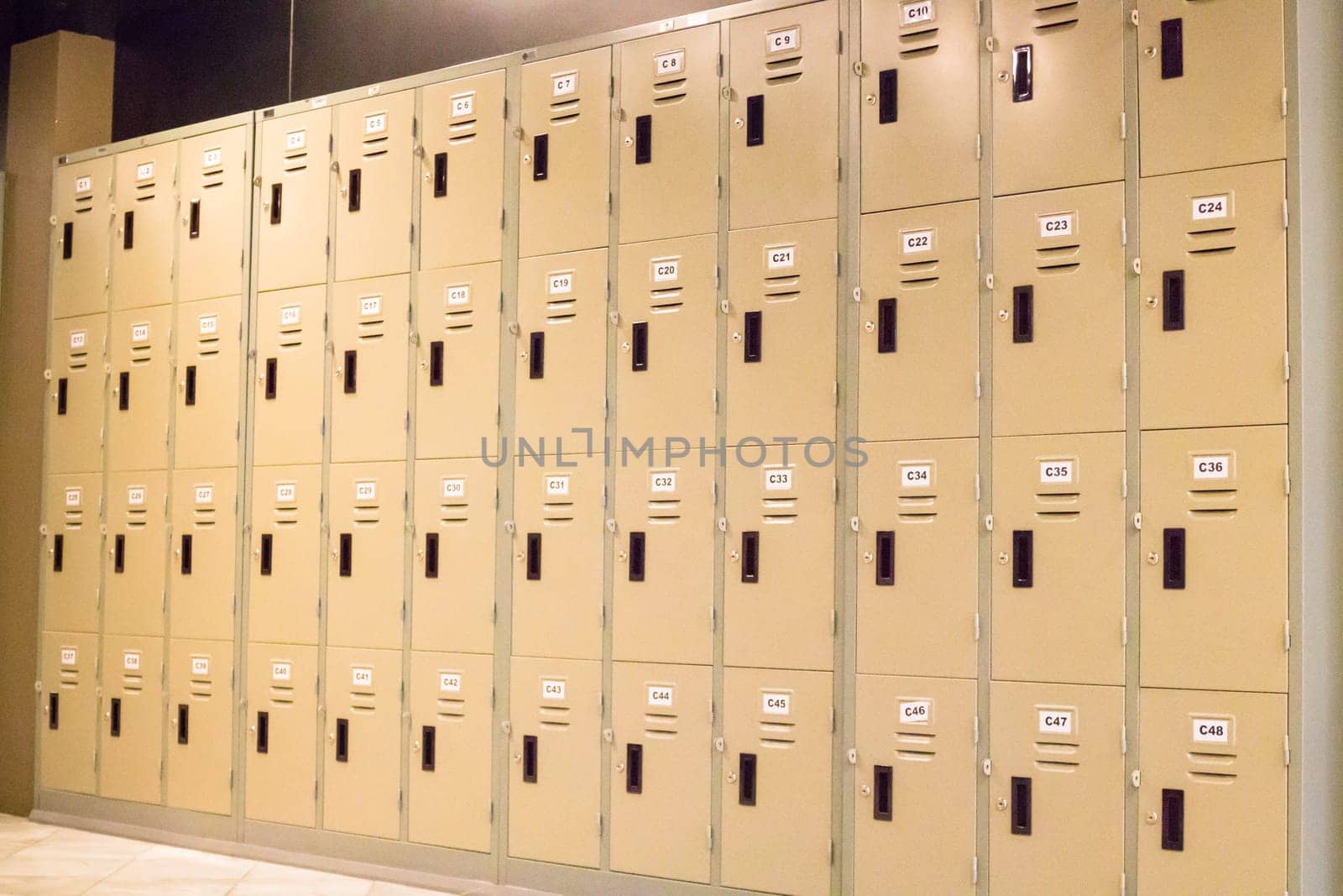 Row Of Old Lockers In School Hallway, stock photo