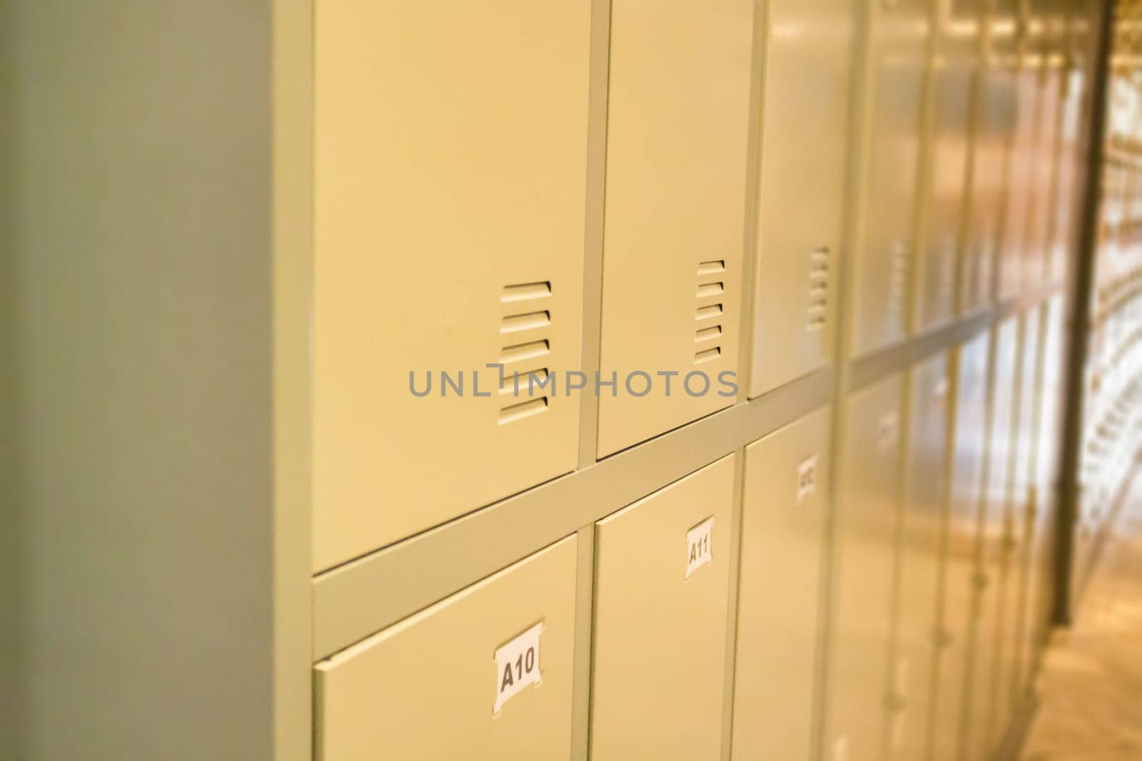 Row Of Old Lockers In School Hallway, stock photo
