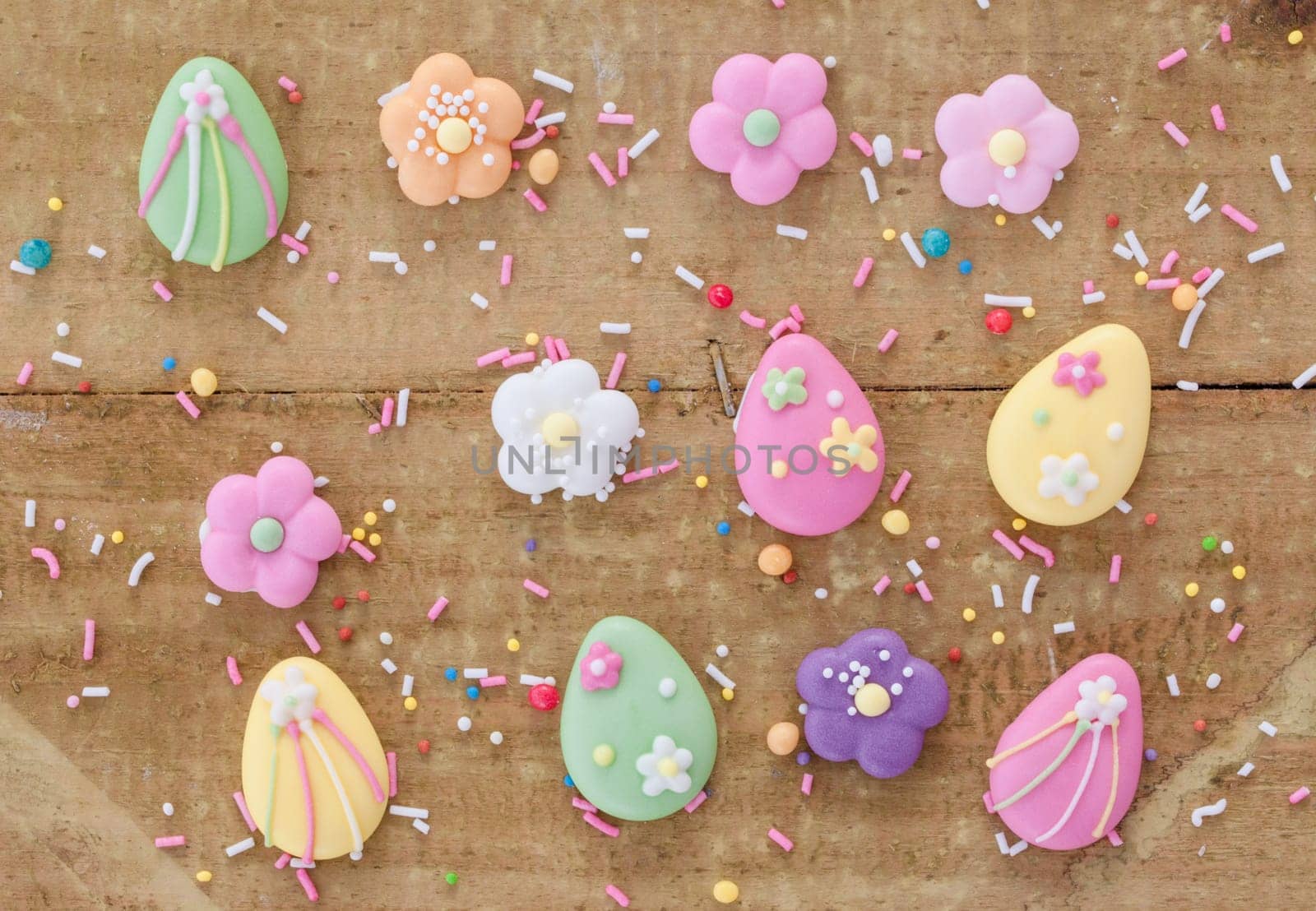 Colorful sugar décor with flowers and eggs