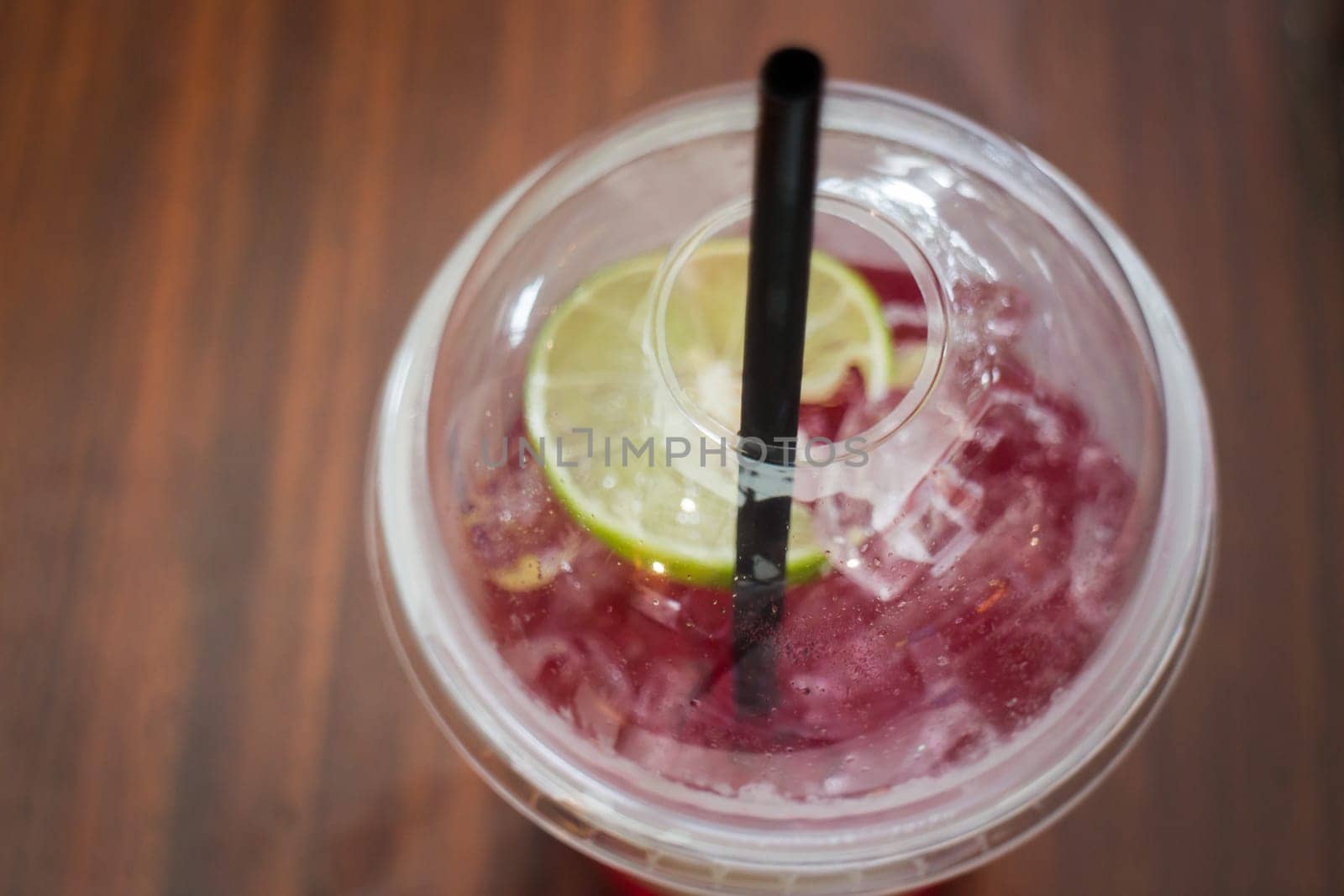 Cold Red Drink With Lime Slice, stock photo