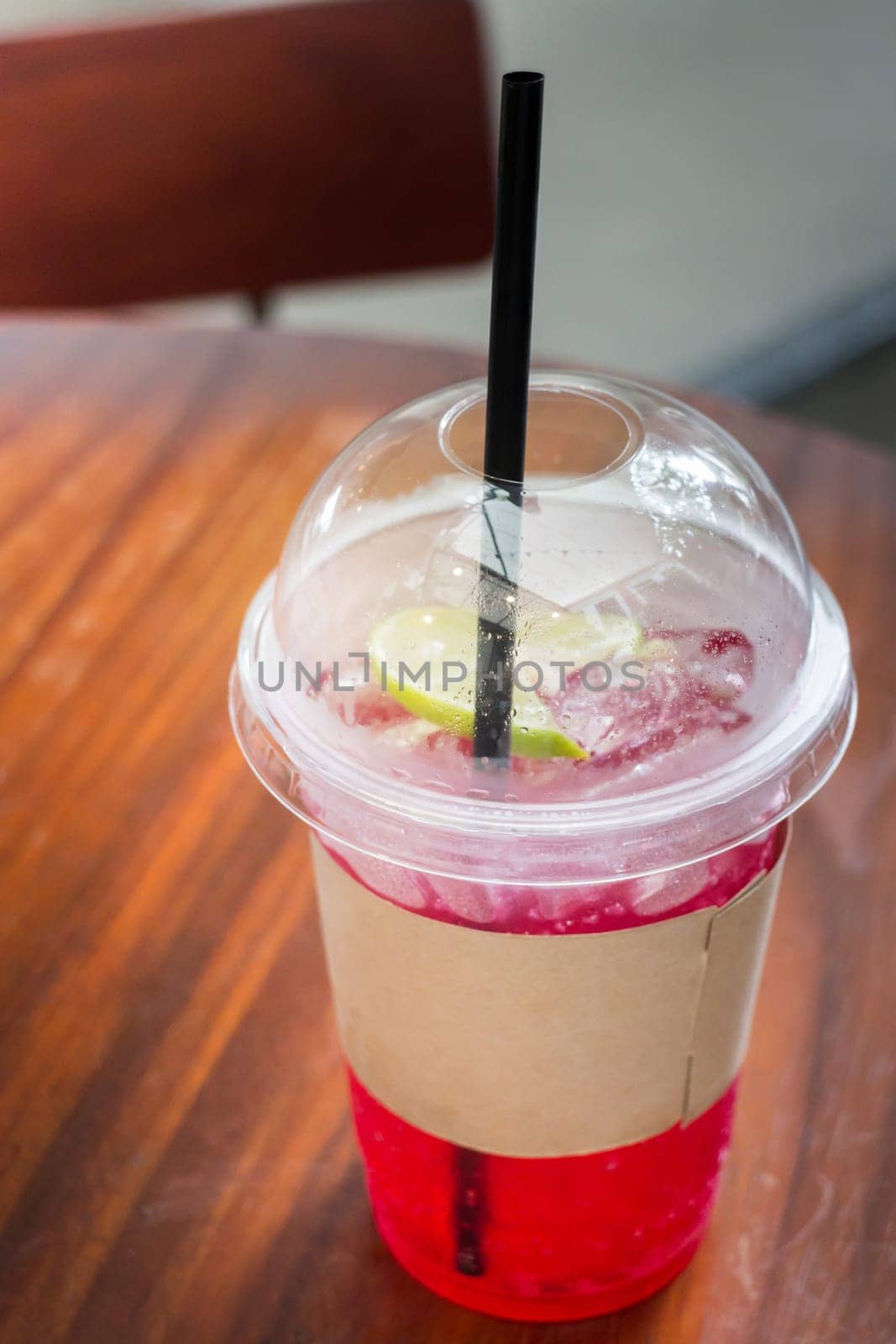 Cold Red Drink With Lime Slice, stock photo