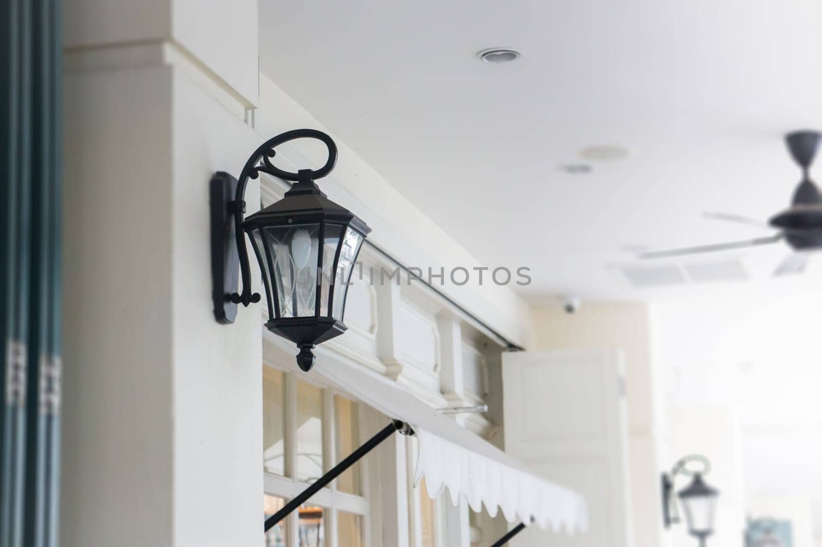 Vintage Sidewalk Lamp In Front Of Store, stock photo