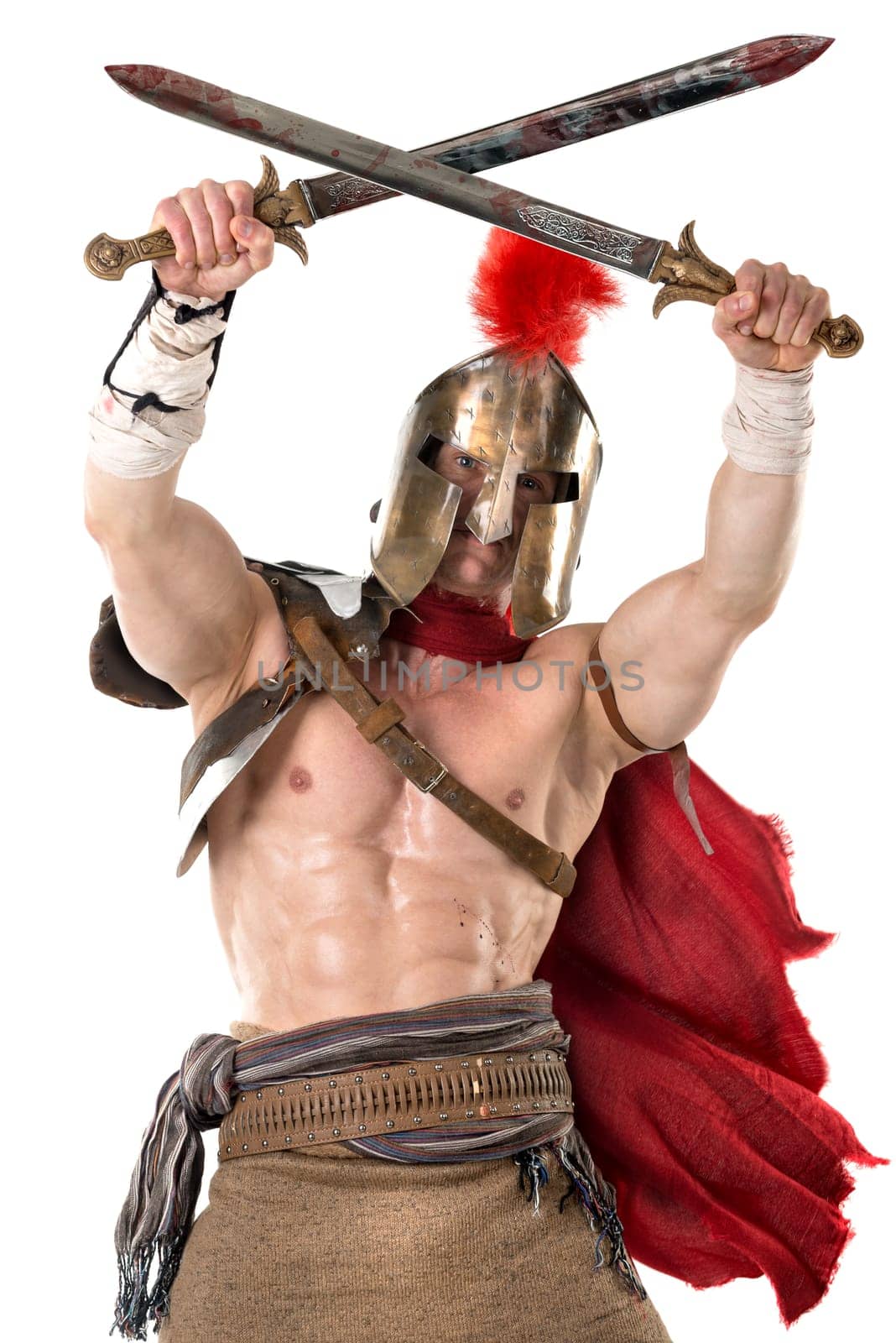 Ancient warrior or Gladiator posing over a white background
