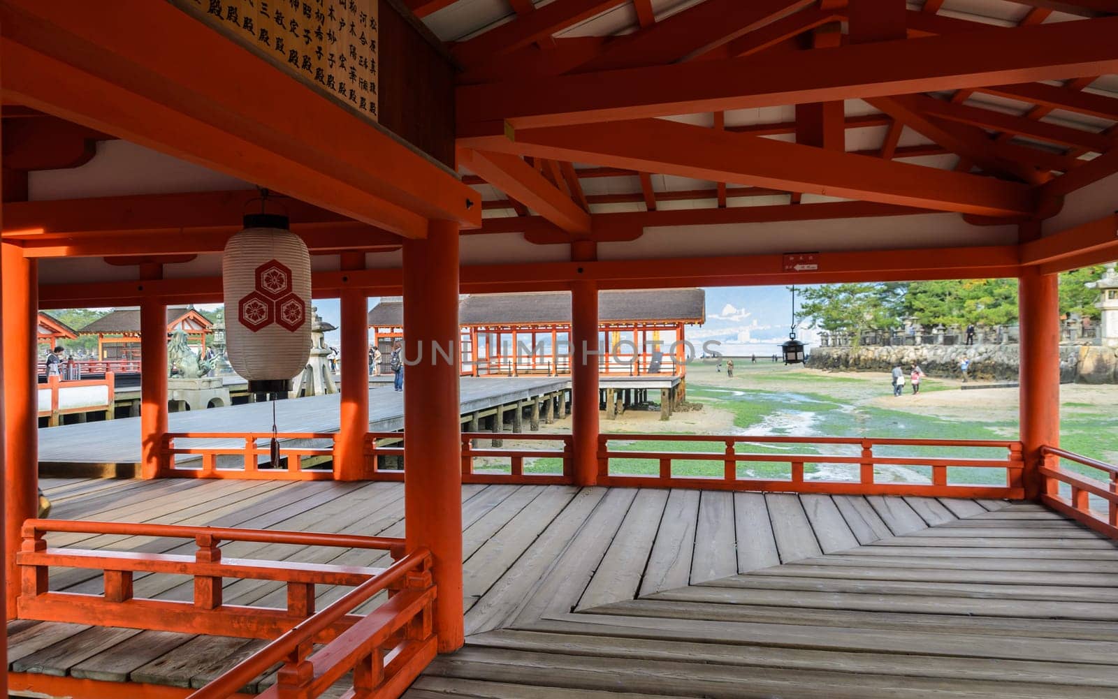 Floating Shrine's hall and pathway of Itsukushima Shrine at low tide in Miyajima island, Japan