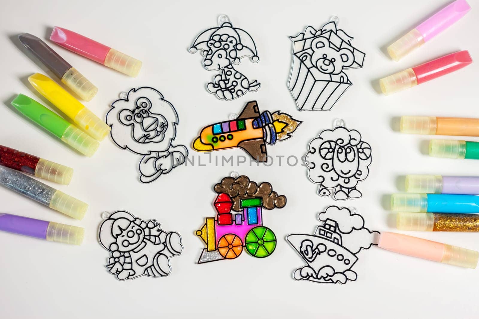 set of paints for stained glass and coloring pictures