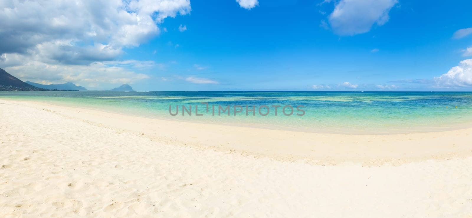 Sandy tropical Wolmar beach at sunny day. Panorama. Mauritius