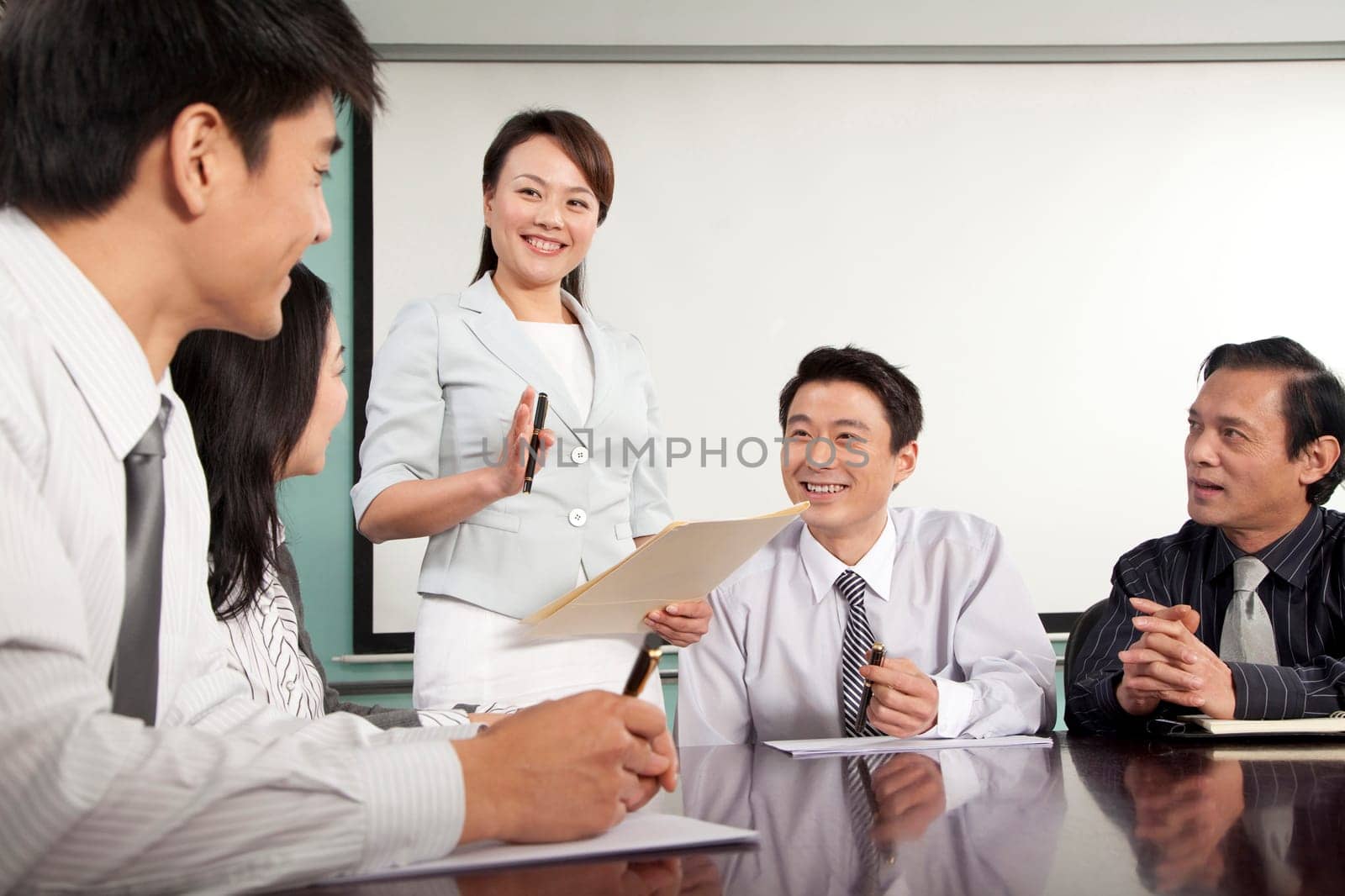 Business Team Working Together by XiXinXing