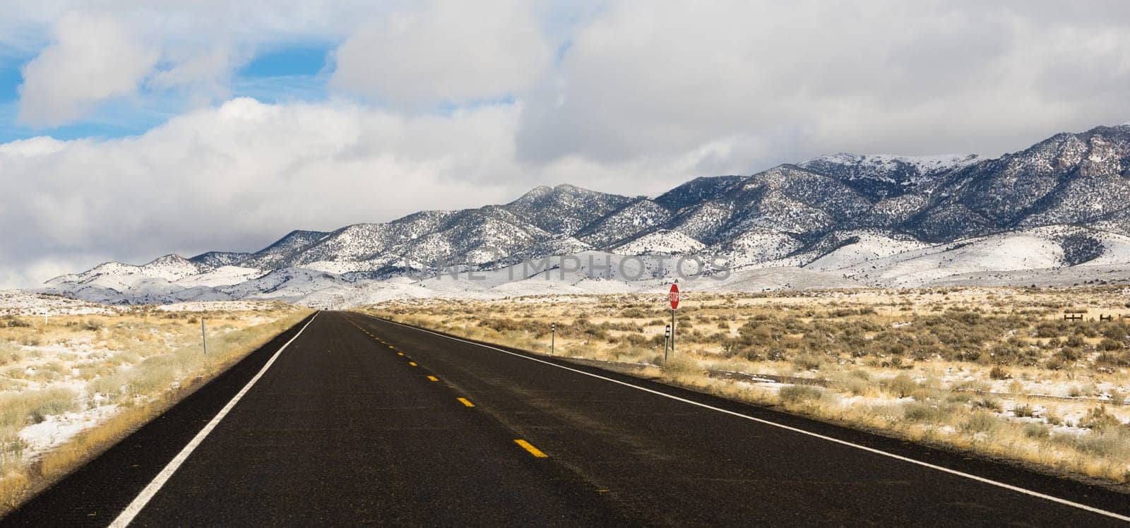 Long set of snowcovered foothills and ridges along highway 50 in Nevada