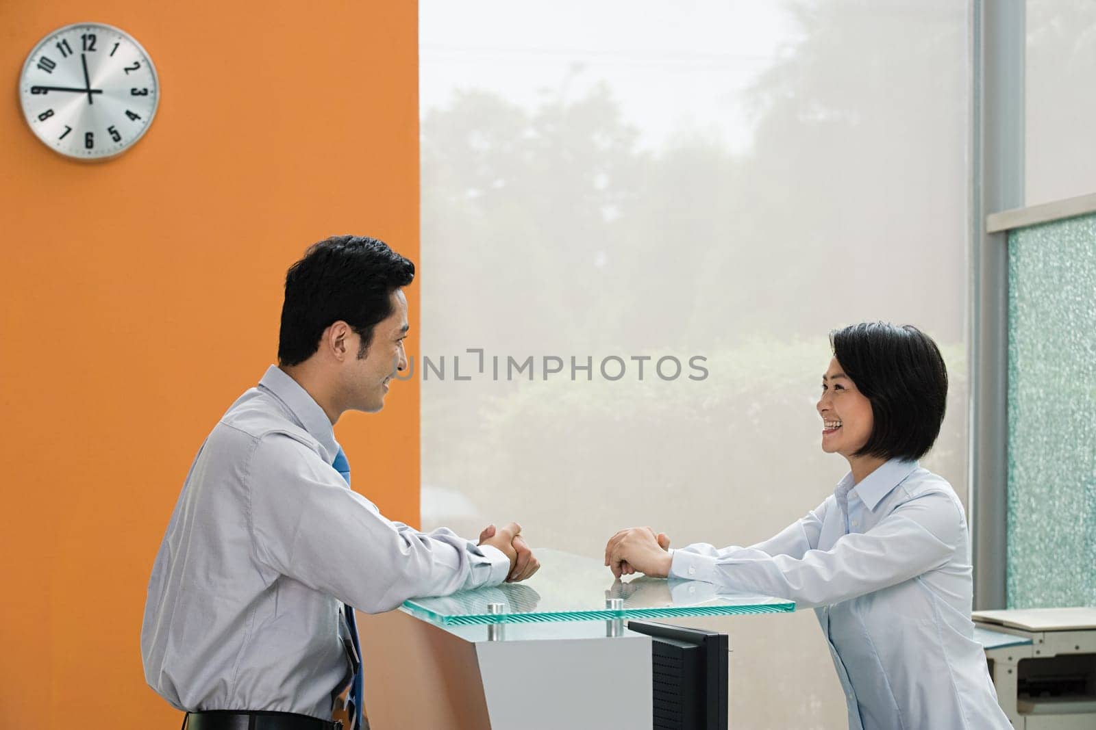 Two Chinese office colleagues