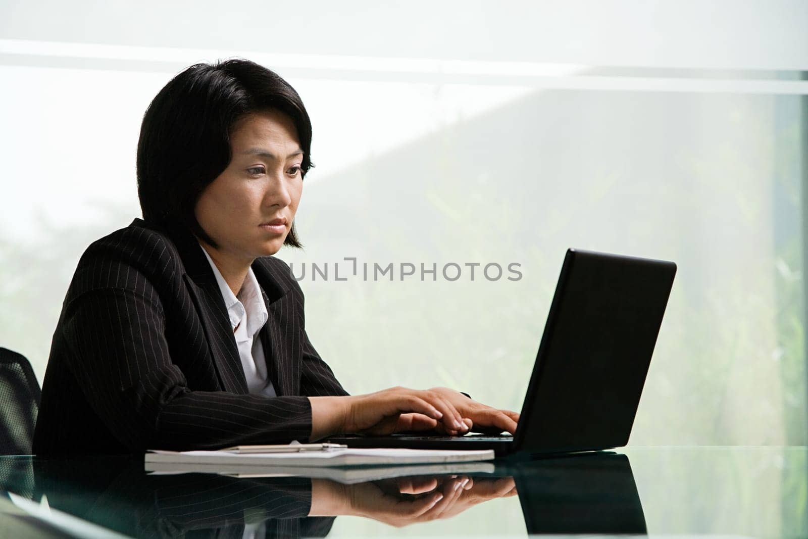 Chinese businesswoman at work