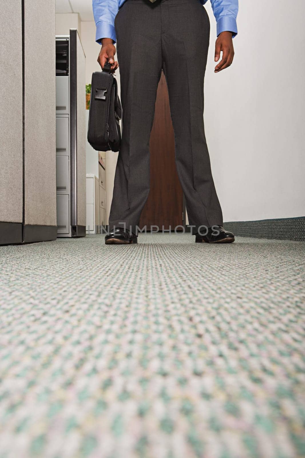 Businessman stood in corridor