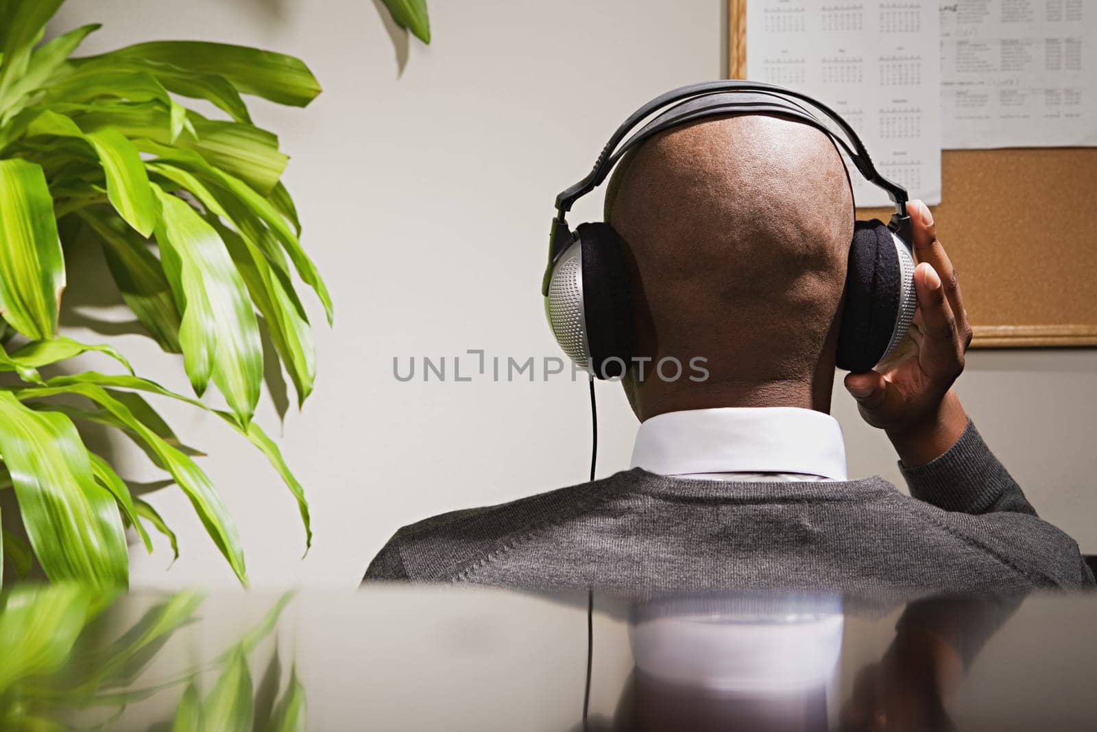 Businessman wearing headphones