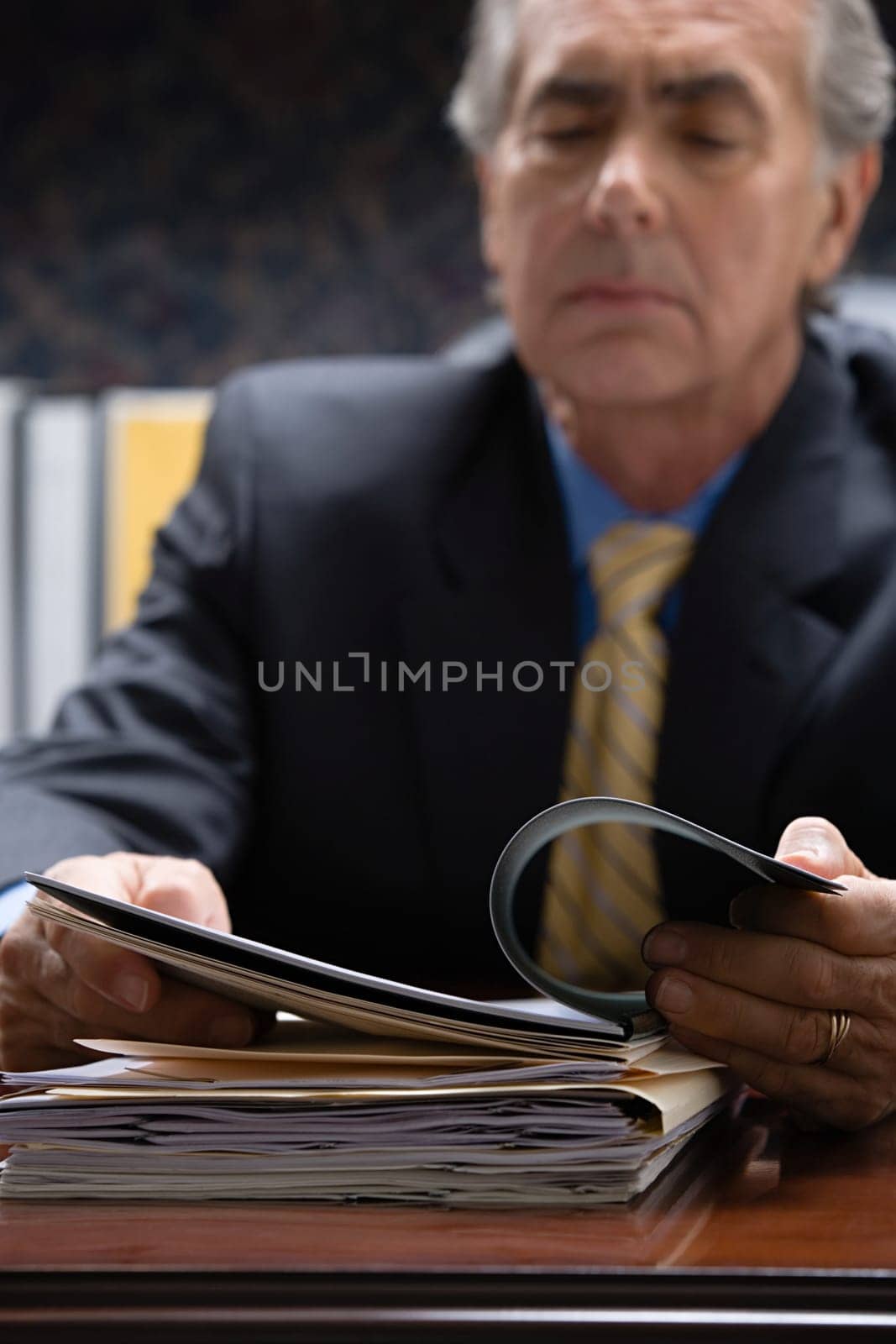 Businessman looking at file