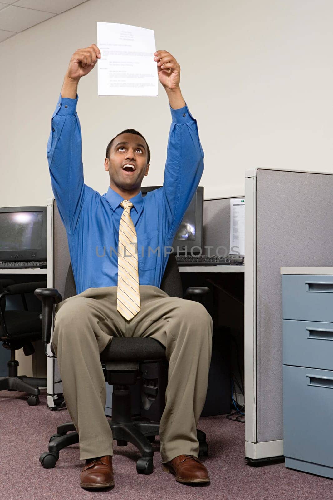 Man holding up his resume