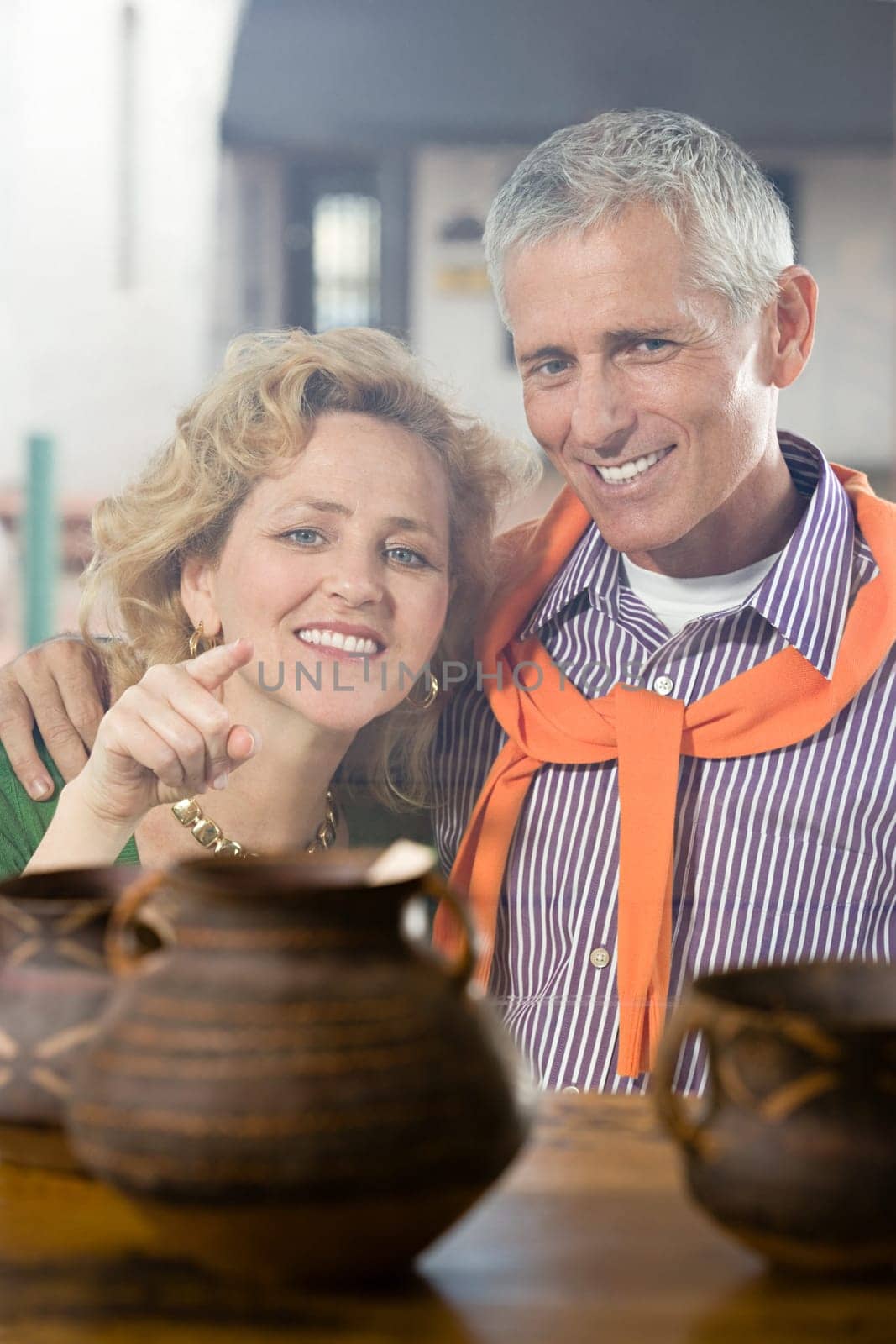 Woman looking at pottery