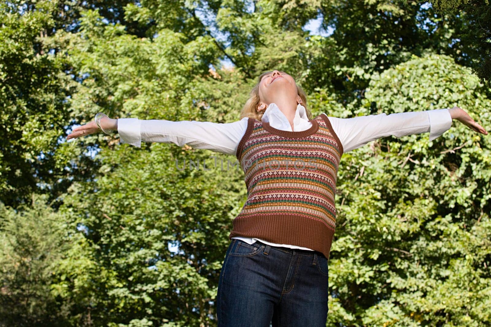 Exhilarated woman outdoors