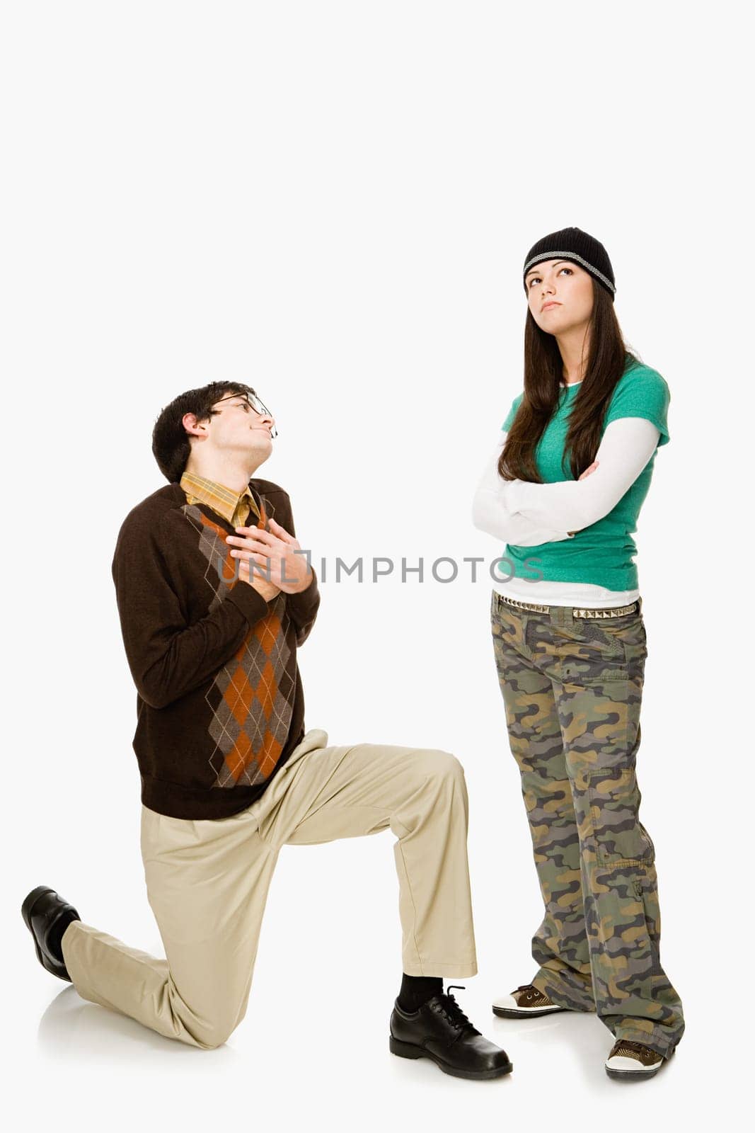 Boy pleading with girl