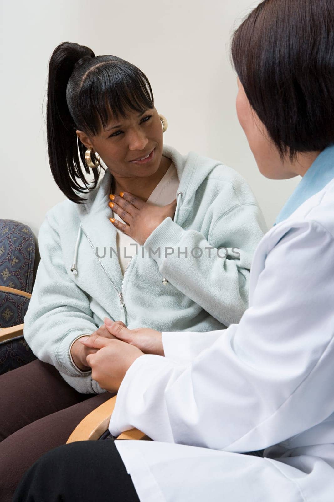 Doctor and shocked patient