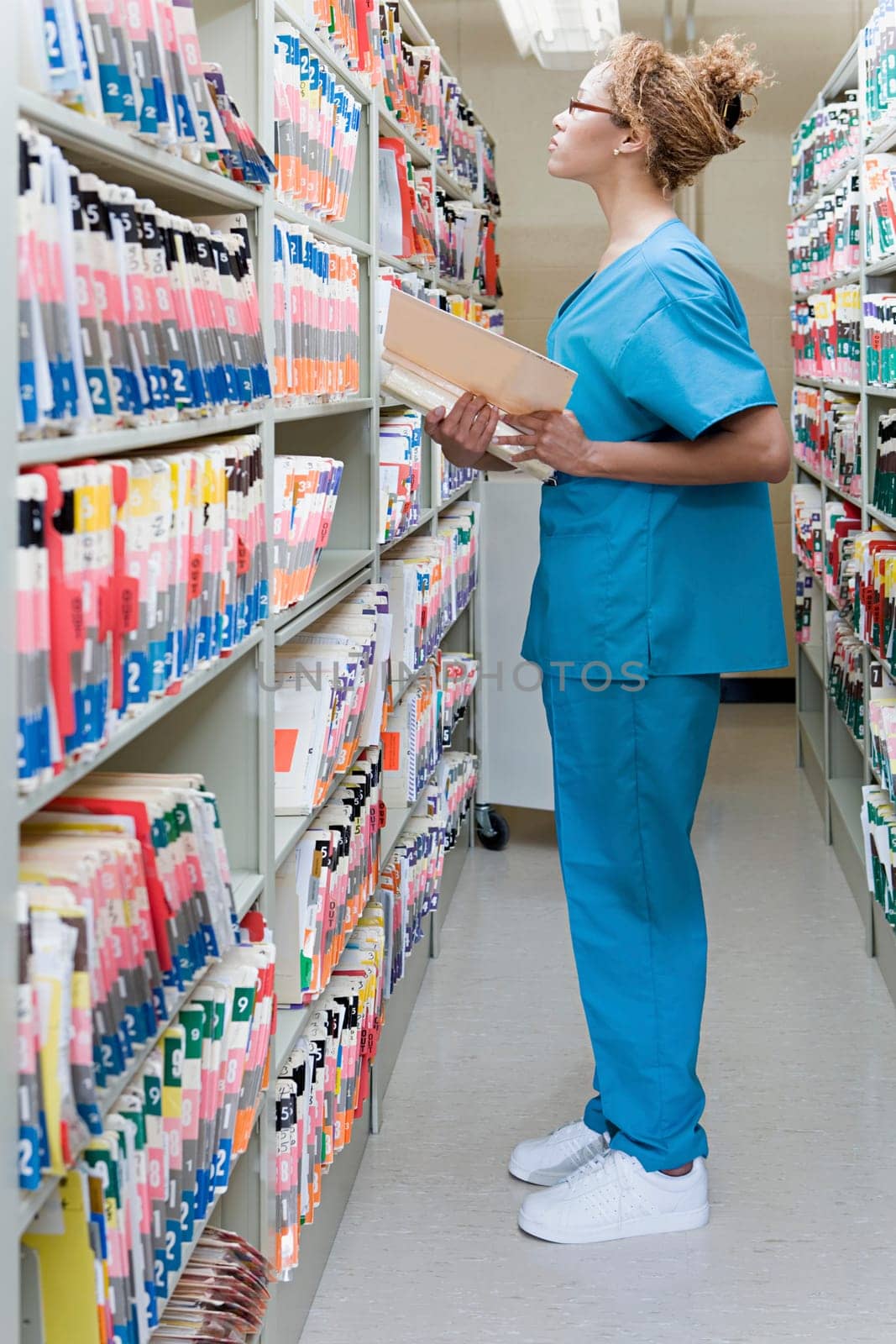 Hospital orderly in archives