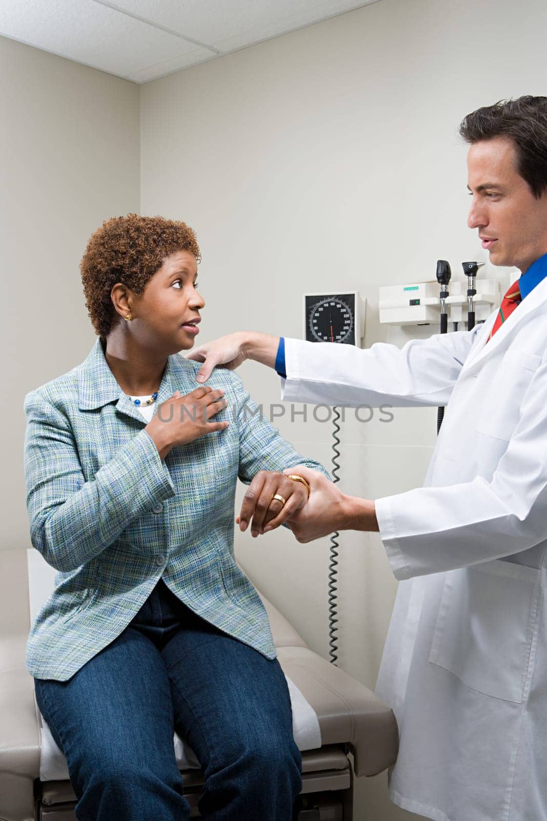 Doctor examining woman