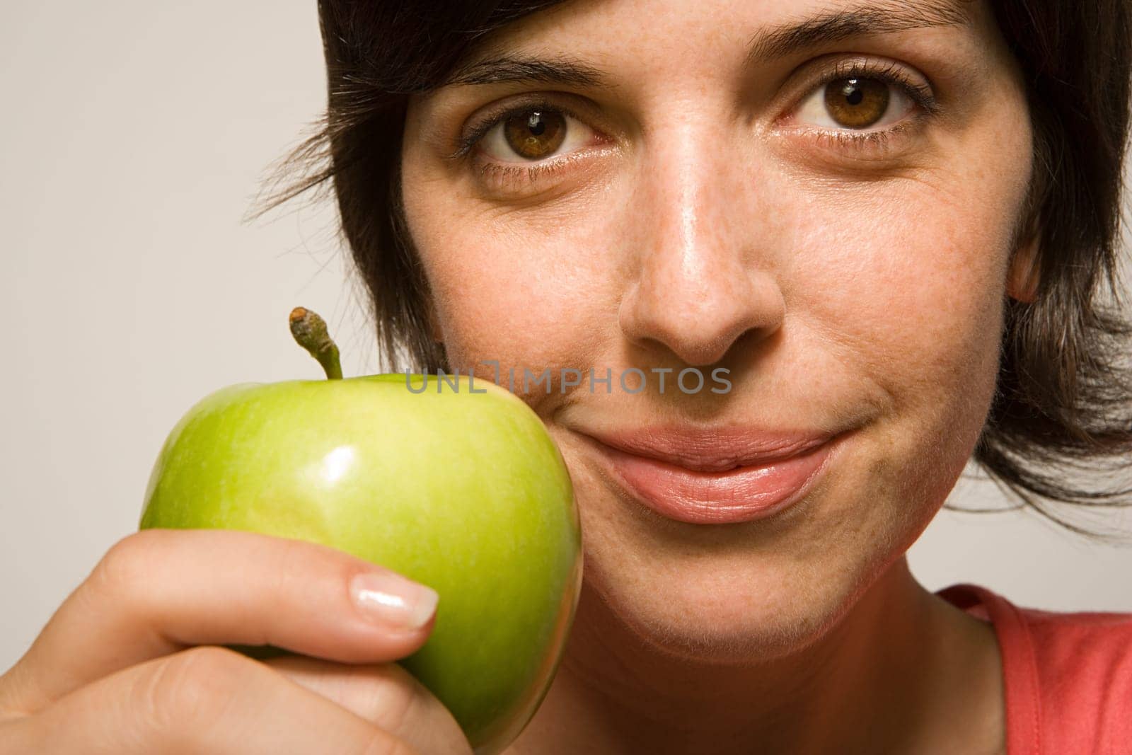 Woman holding an apple