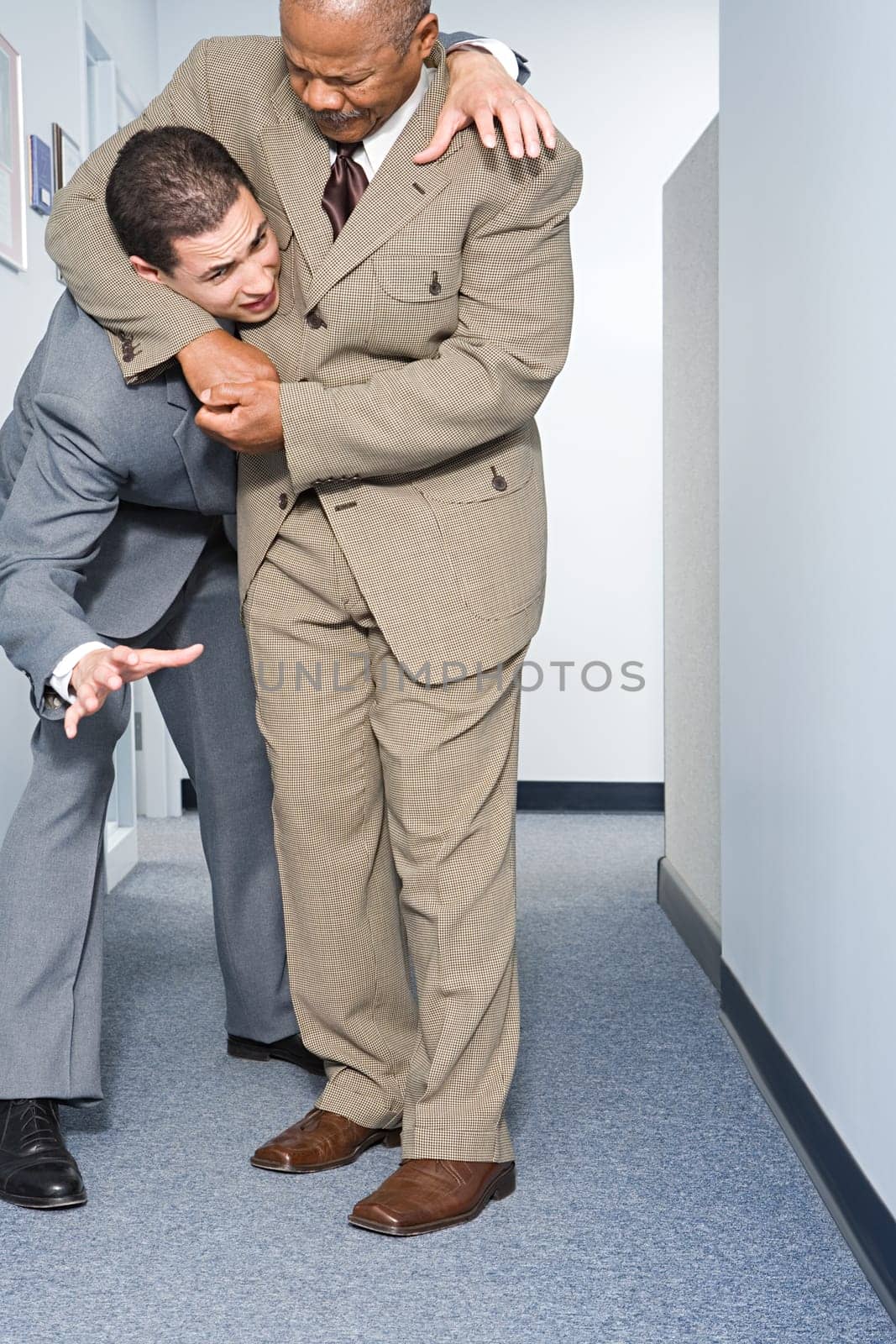 Businessmen fighting