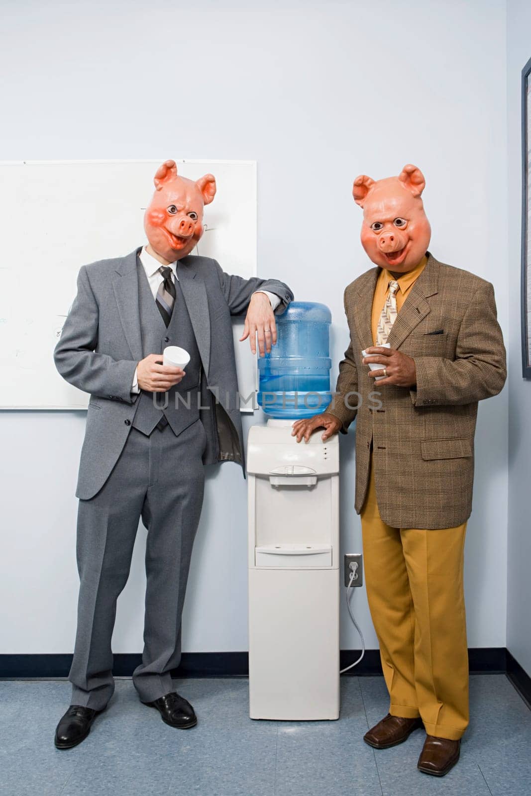 Two businessmen in pig masks