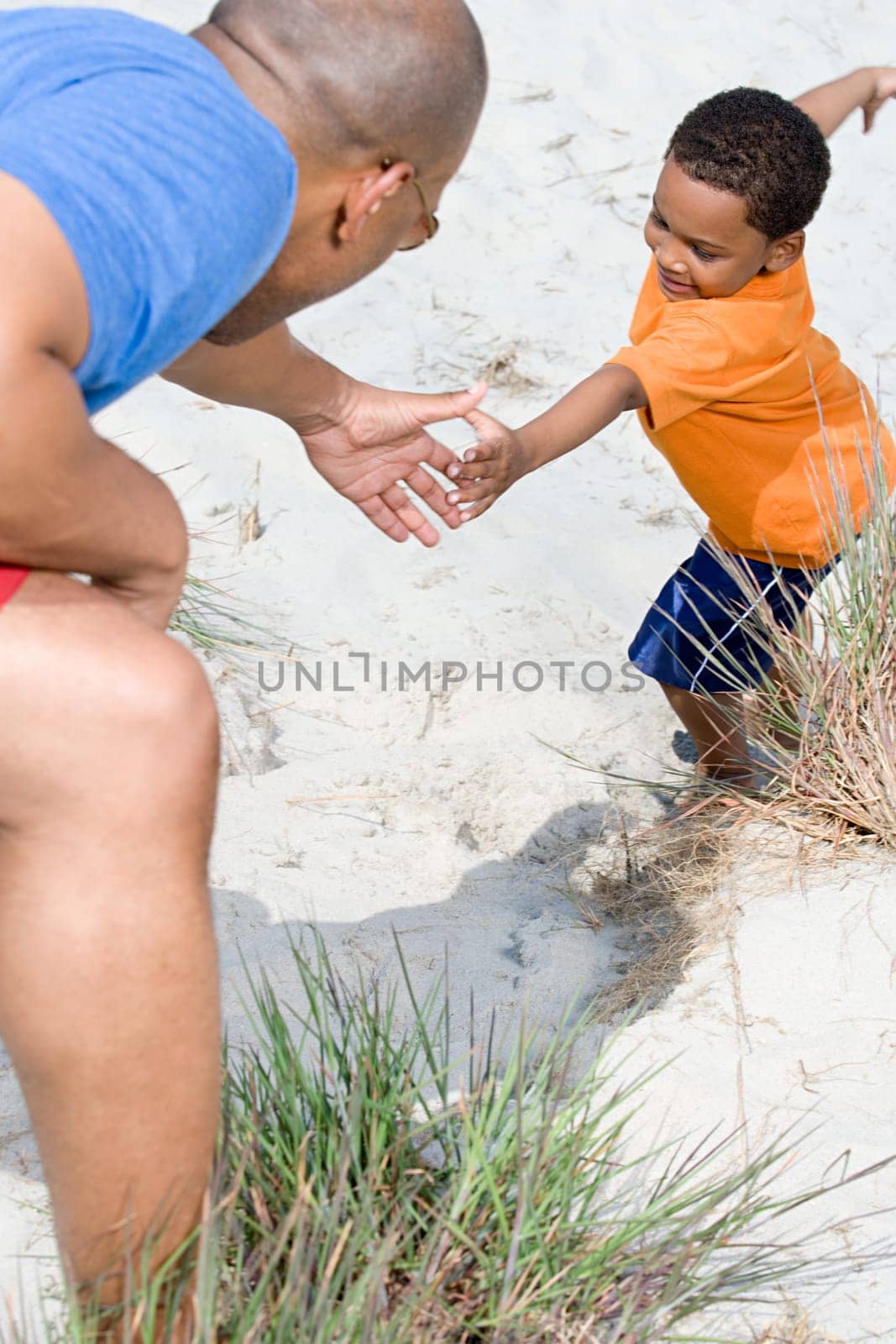 Father helping son