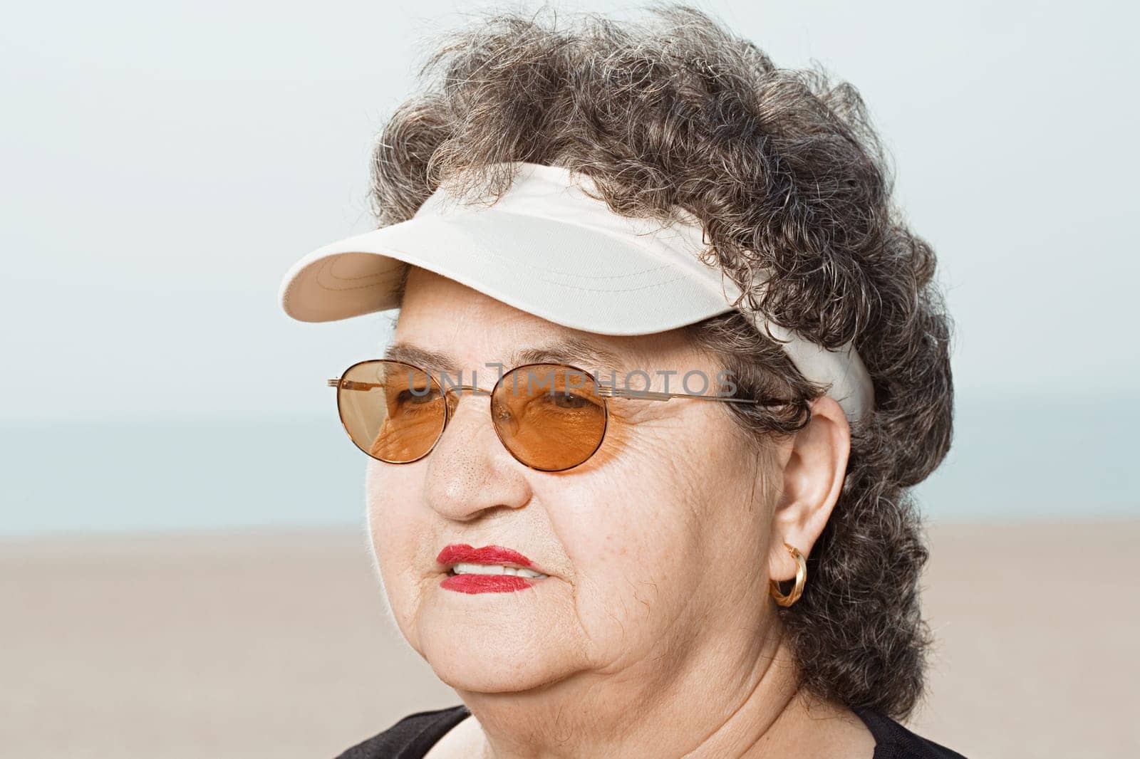 Woman wearing a sun visor