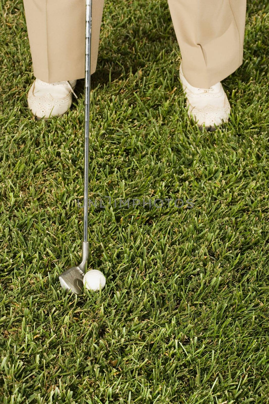 Senior man playing golf