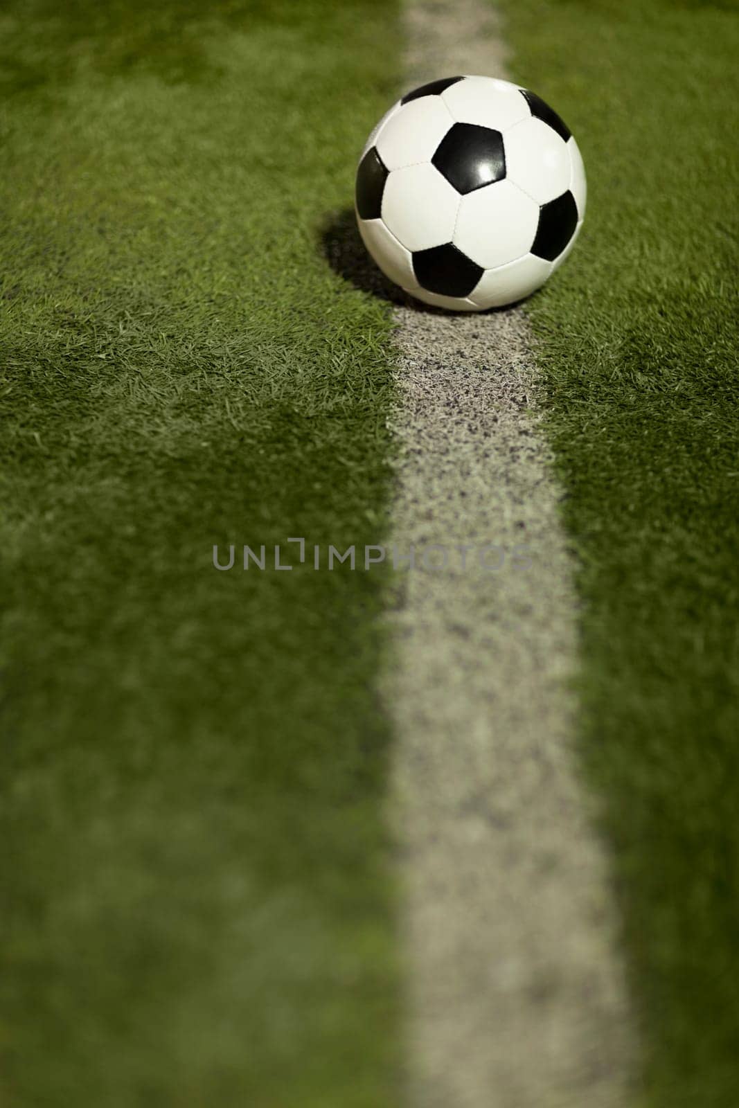 Soccer ball on sports field
