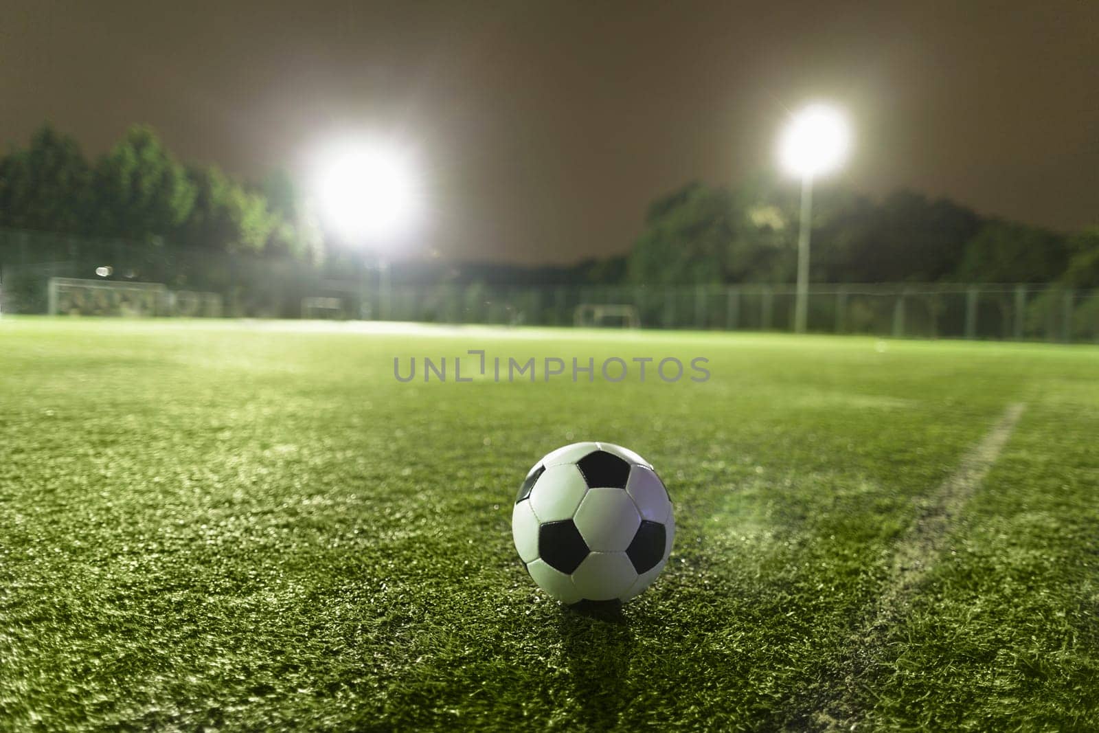 Soccer ball on sports field