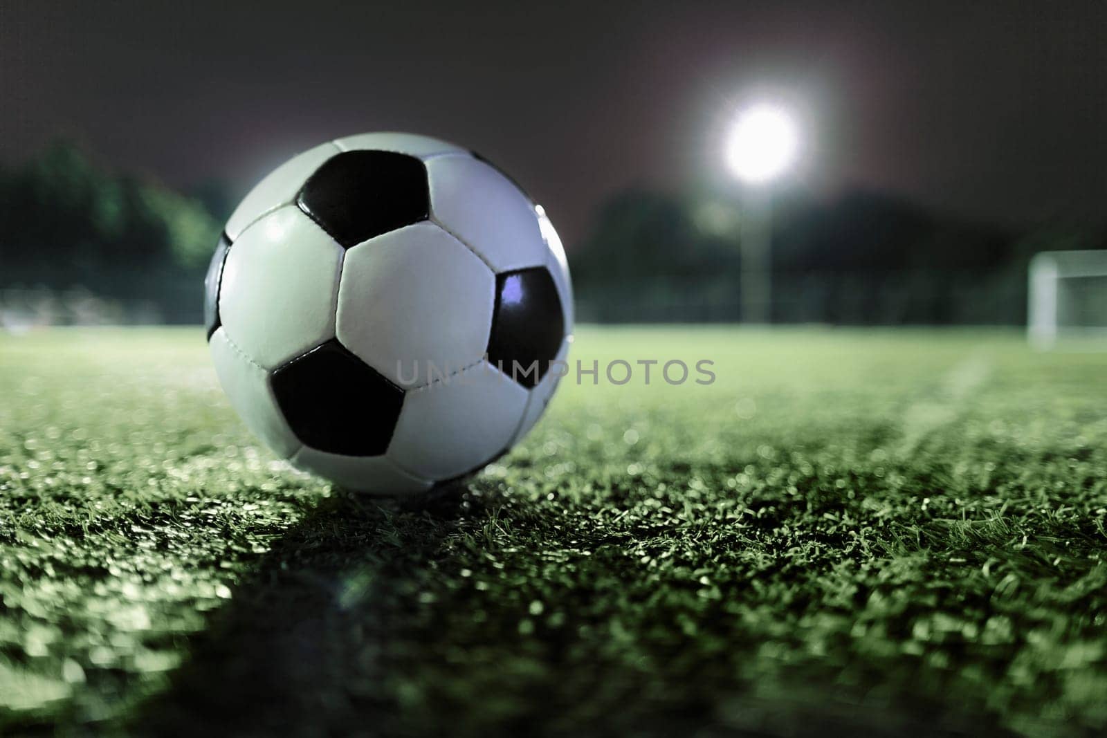 Soccer ball on sports field