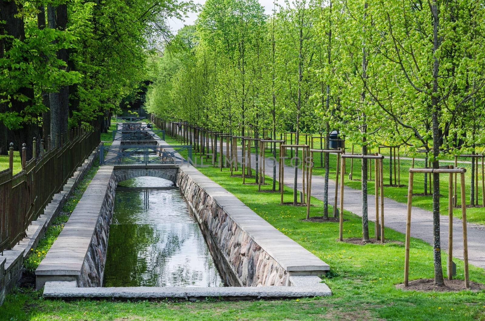 TALLINN, ESTONIA - MAY 15: Picturesque water canal in spring time Kadriorg park on May 15, 2016 in Tallinn, Estonia.