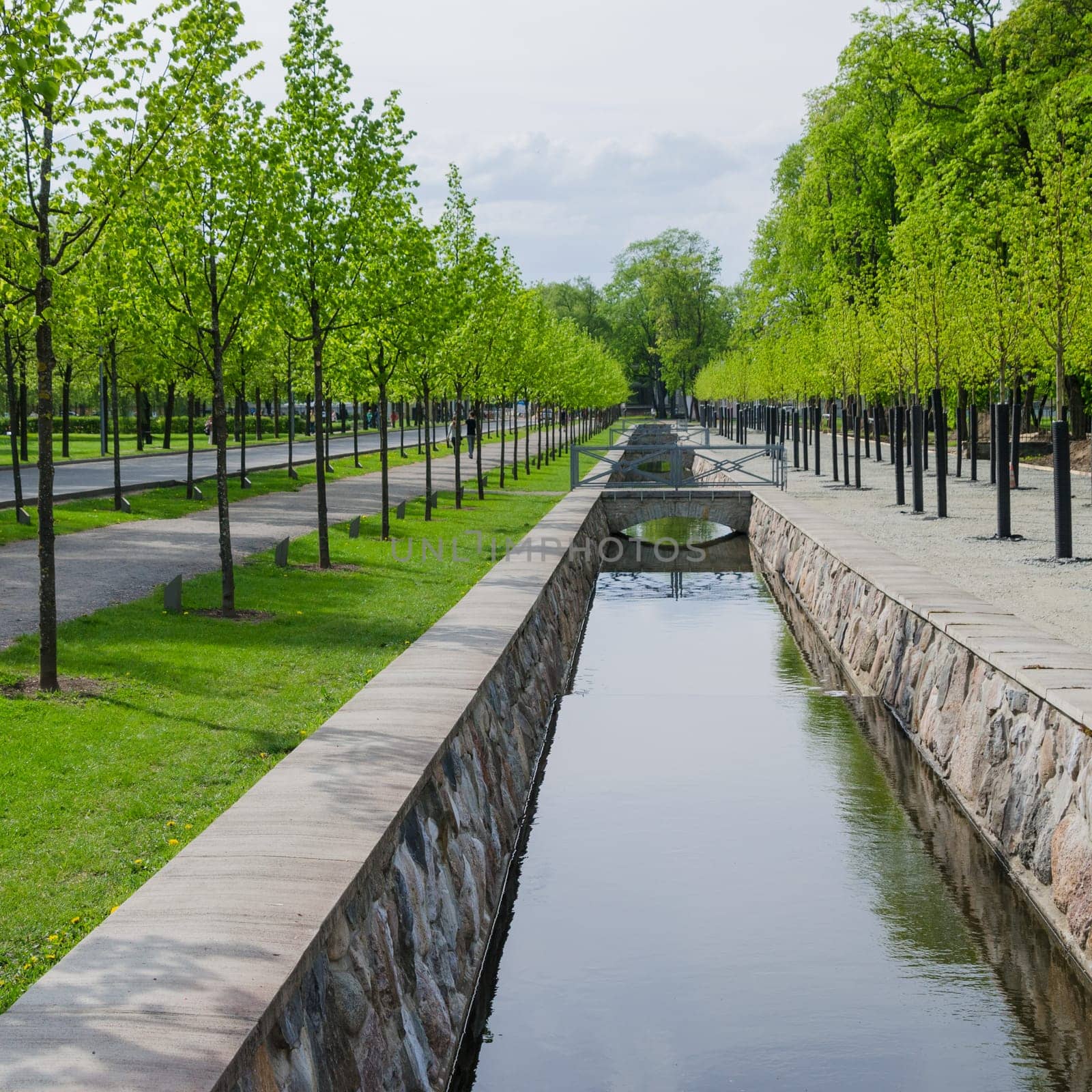 TALLINN, ESTONIA - MAY 15: Picturesque water canal in spring time Kadriorg park on May 15, 2016 in Tallinn, Estonia.