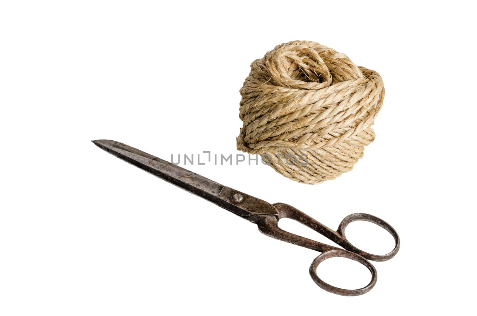 Old scissors and twine, it is isolated on white