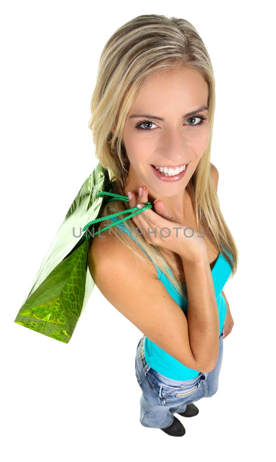 Lovely blond shopping lady holding colorful bags - isolated
