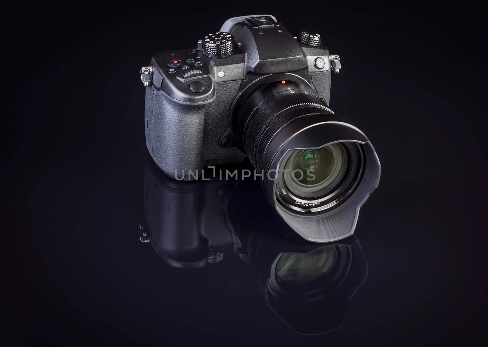 dslr photocamera on black background