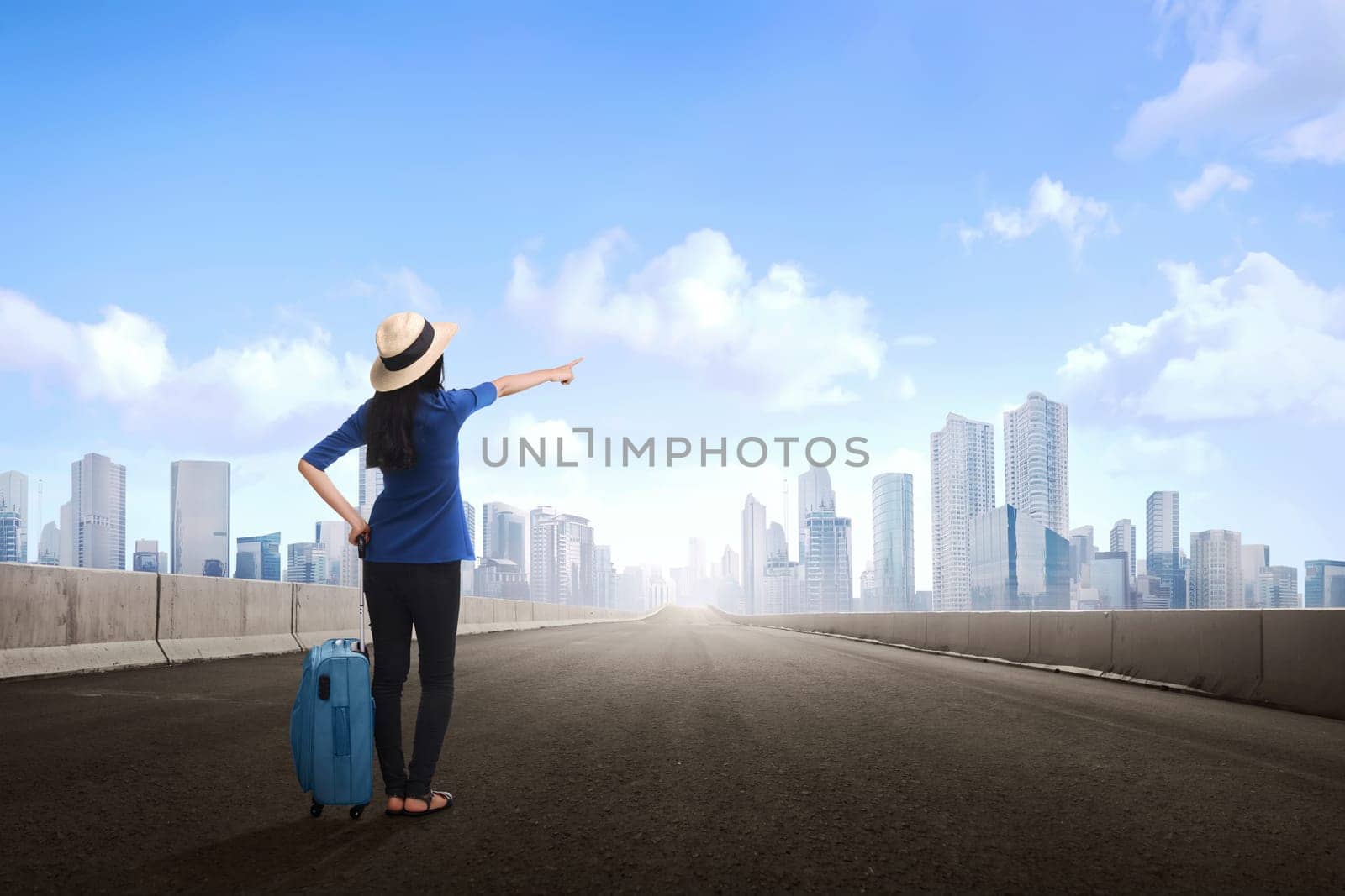 Tired asian traveler woman sitting on luggage waiting flight at terminal airport